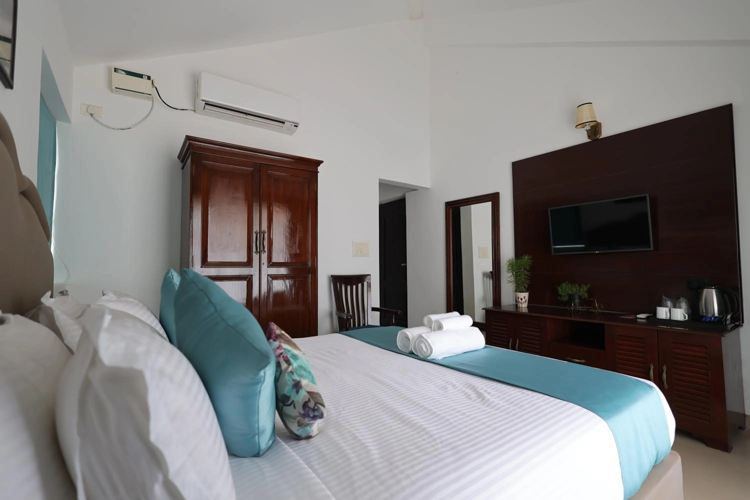 Bed in Casa Ahaana Resort Vagator, By Lavin Hotels