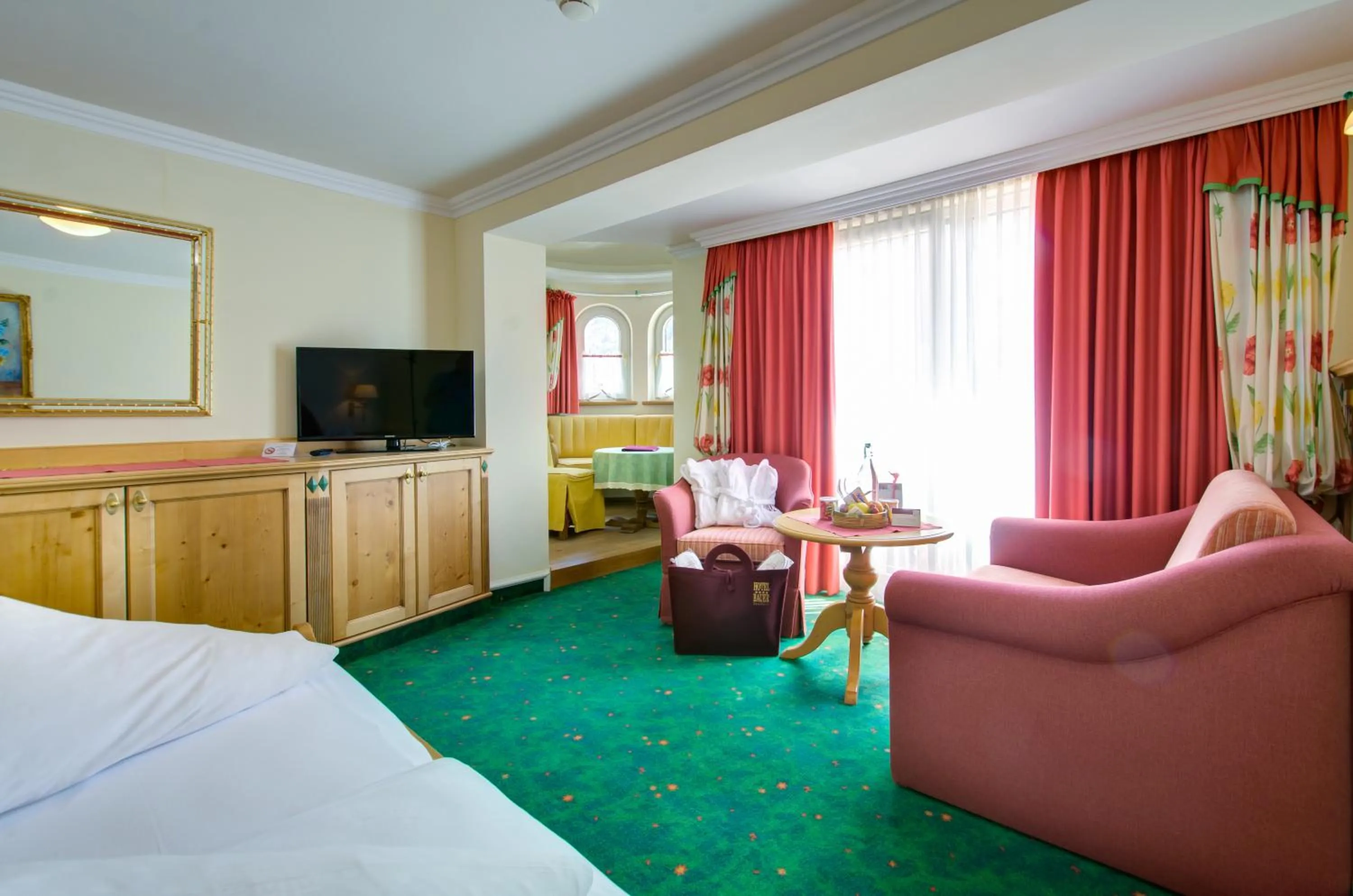 Seating area, Bed in Boutique-Hotel Bauer