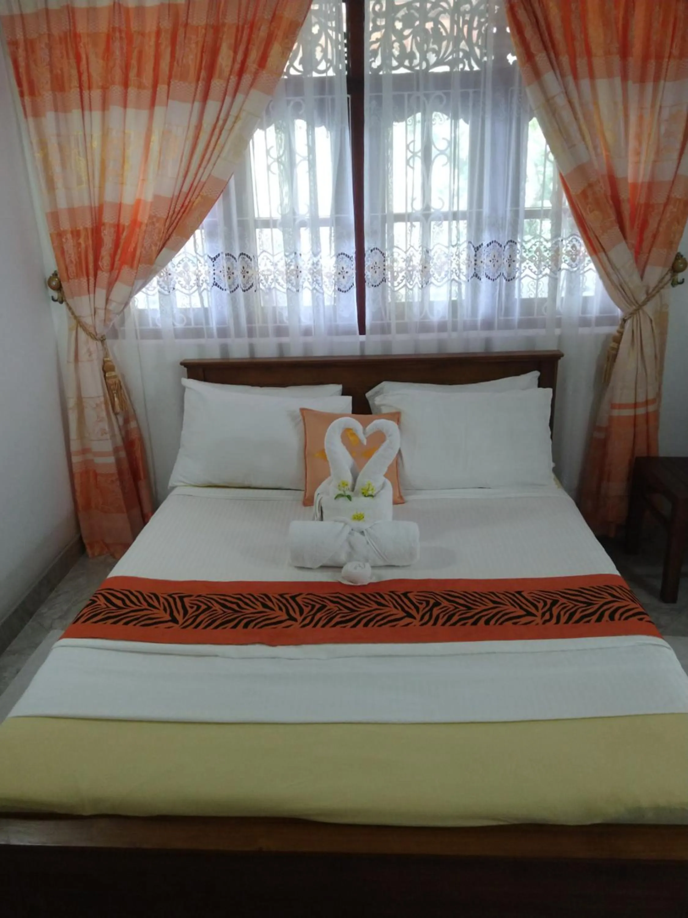 Bed in Lucky Prince Villa & Ayurveda Wellness