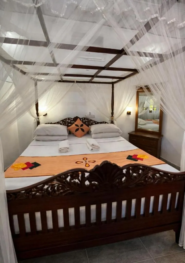 Bed in Lucky Prince Villa & Ayurveda Wellness