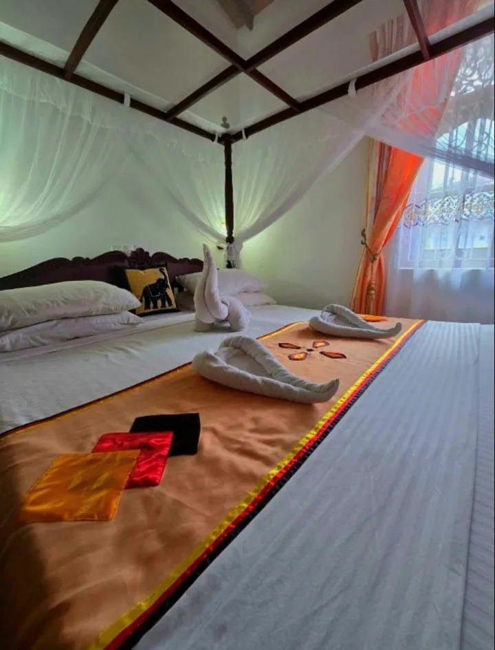 Bed in Lucky Prince Villa & Ayurveda Wellness