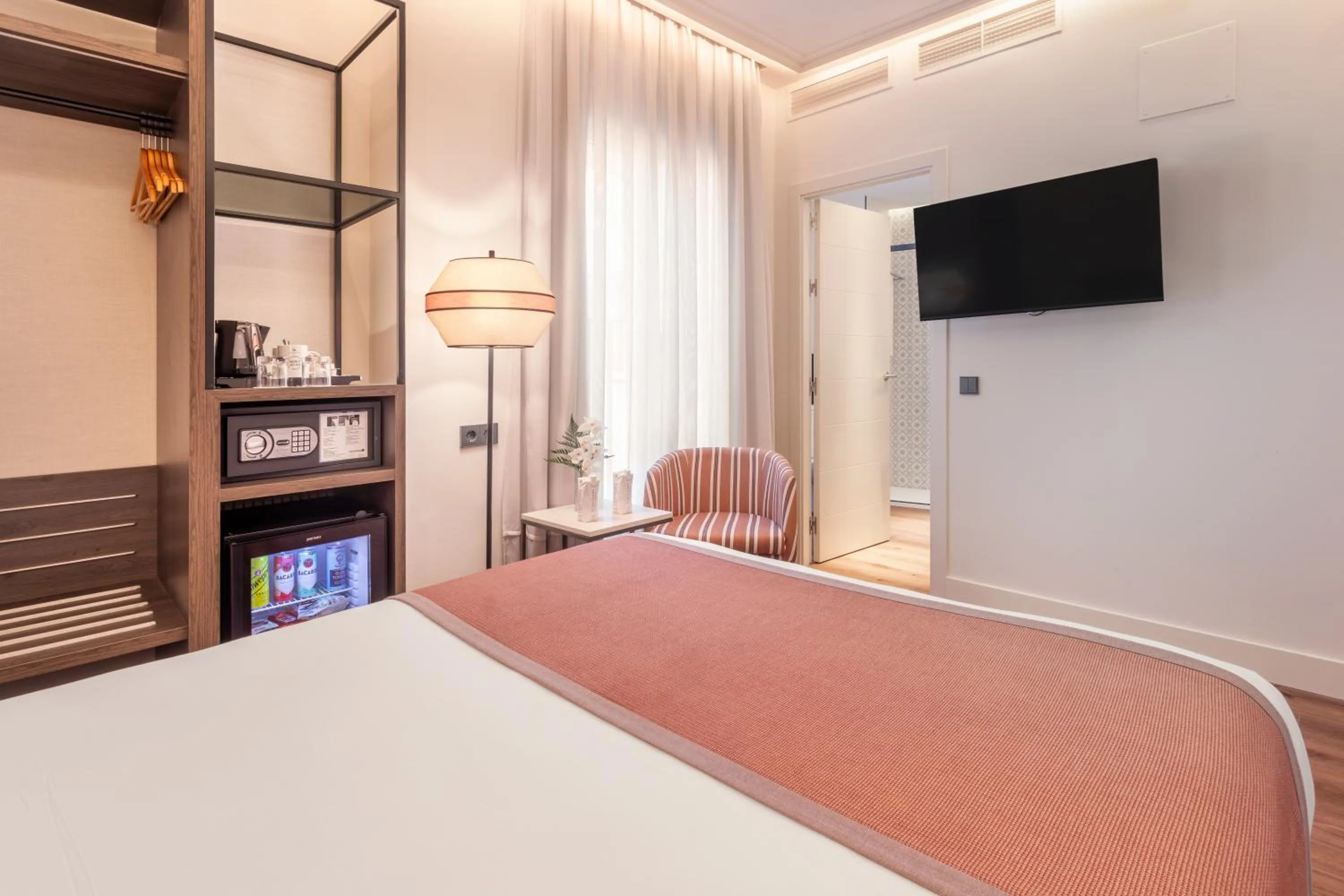 Photo of the whole room, Bed in Eurostars Sevilla Boutique