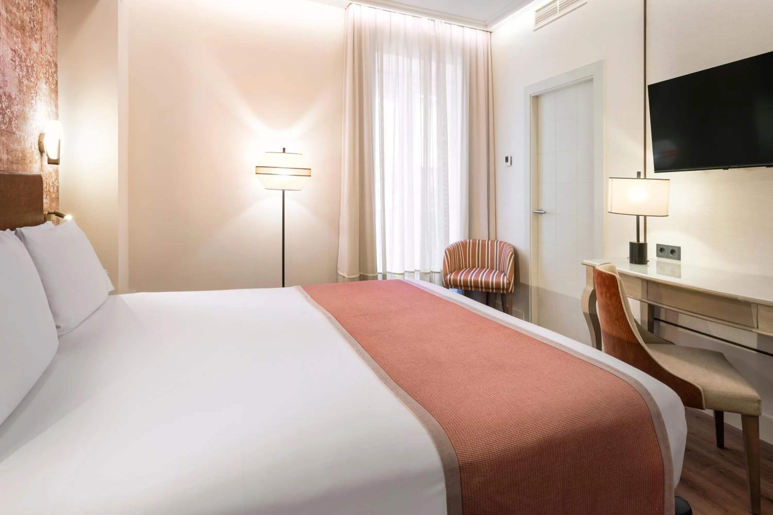 Photo of the whole room, Bed in Eurostars Sevilla Boutique