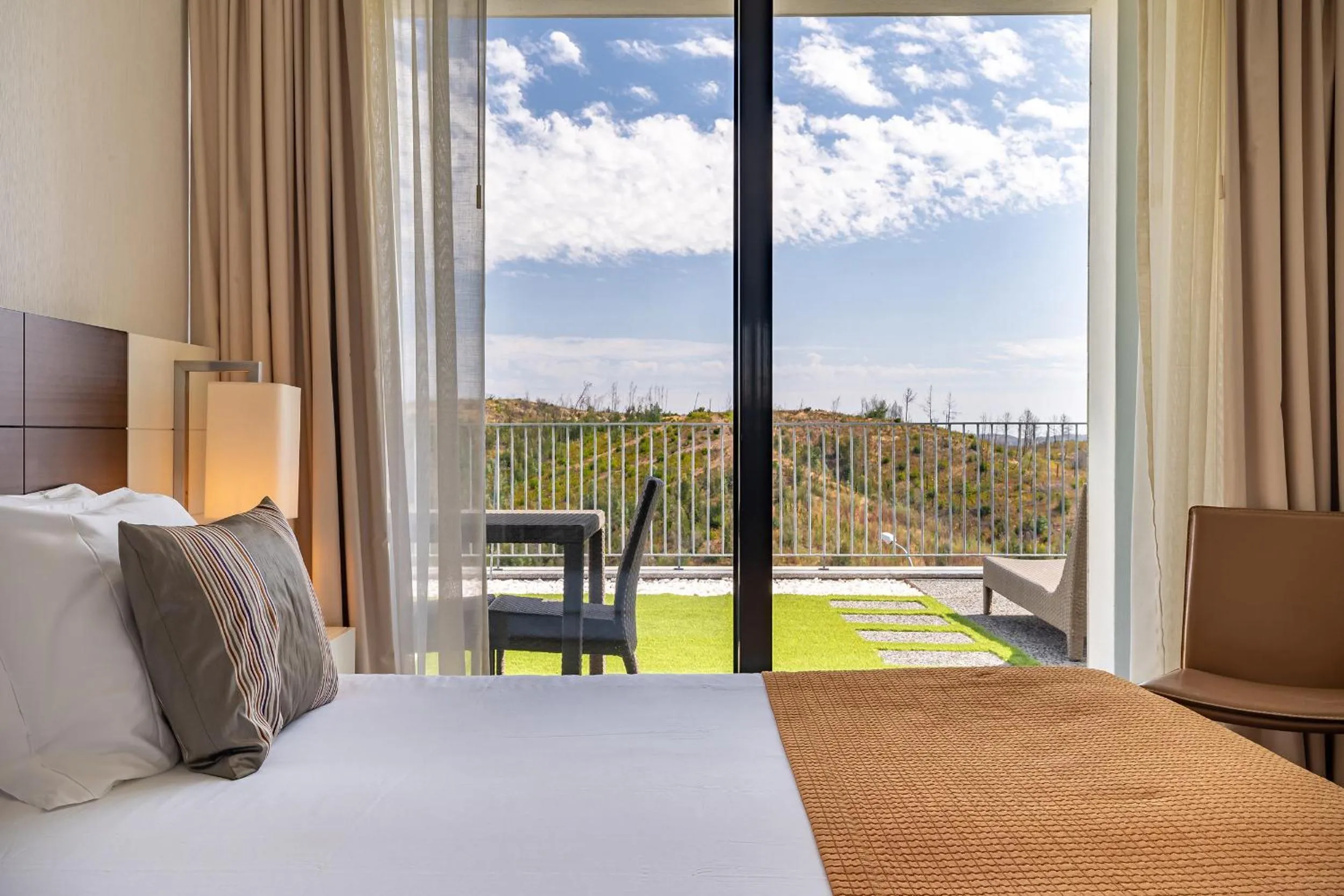 Balcony/Terrace, Bed in Monchique Resort & Spa
