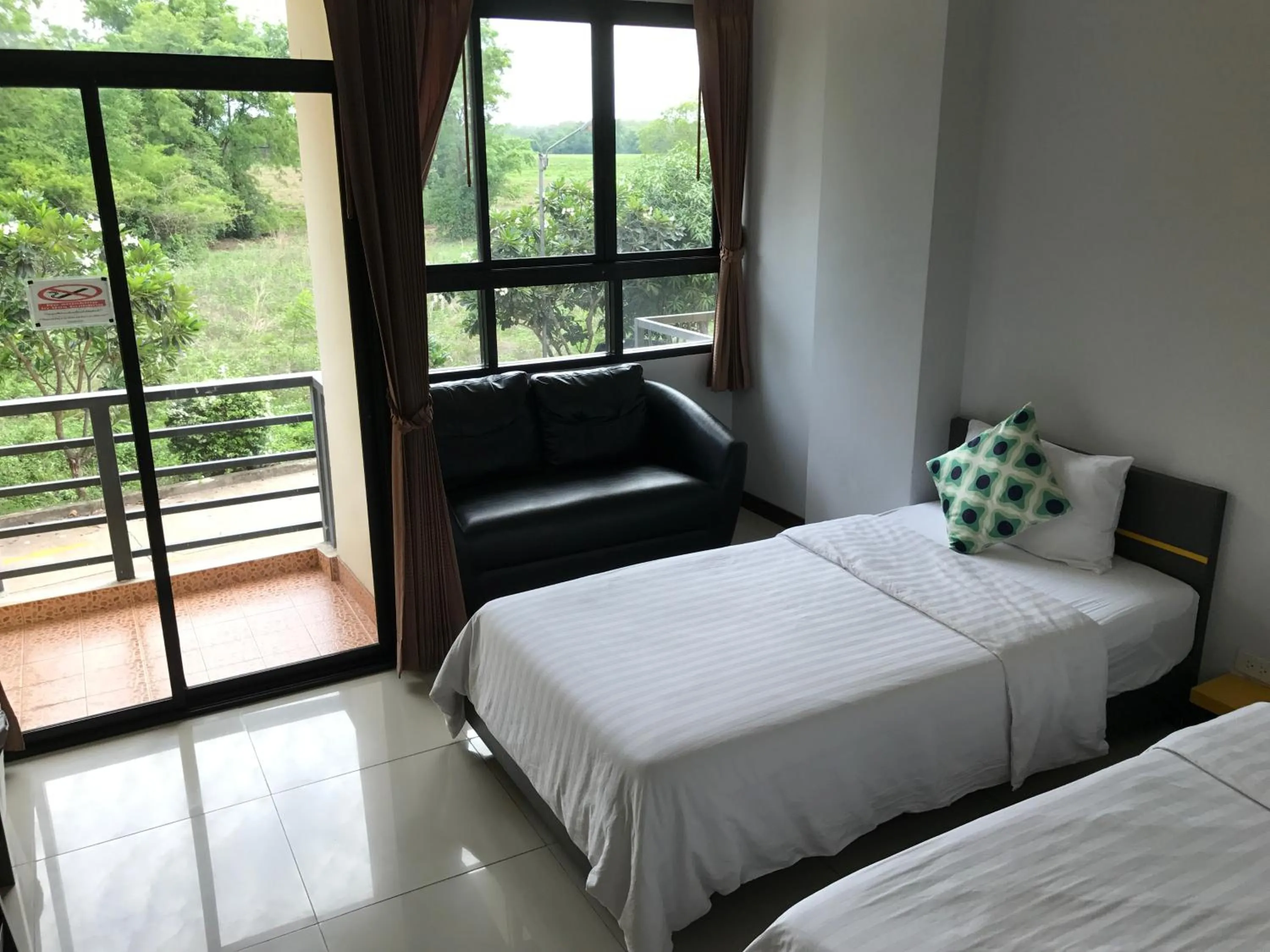 Bed in The Icon service apartment