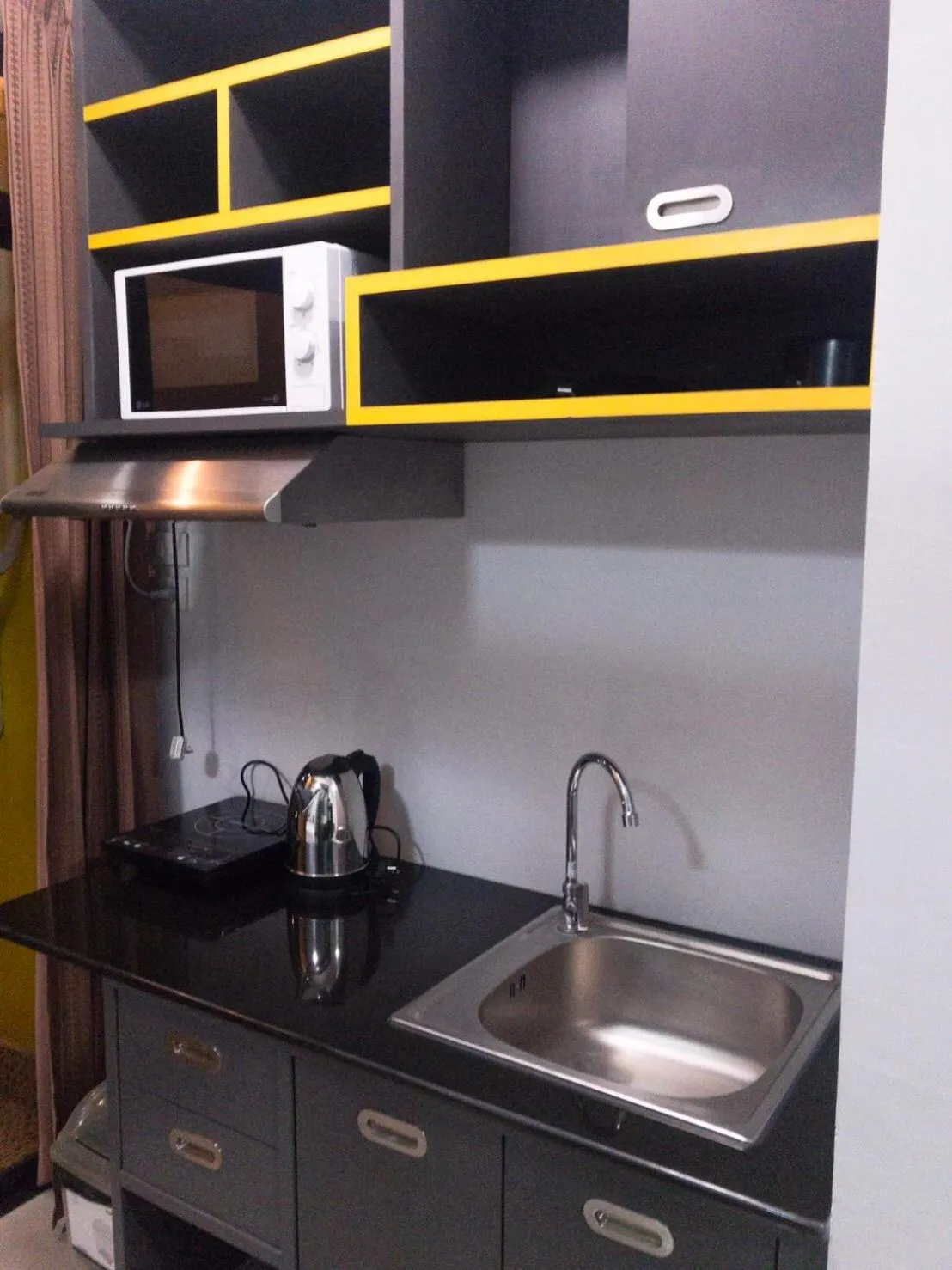 Kitchen or kitchenette in The Icon service apartment