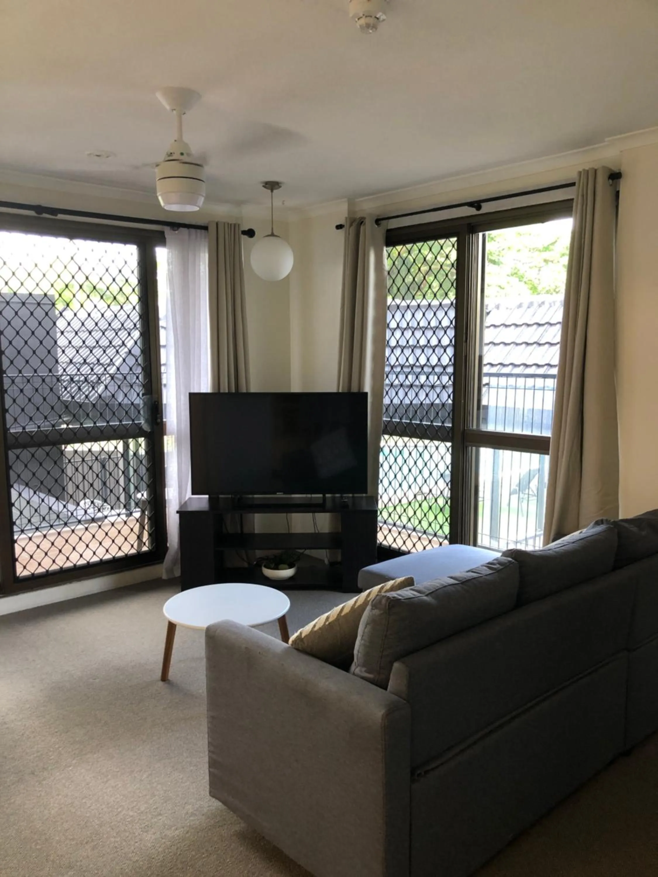 Living room in Coral Towers Holiday Suites