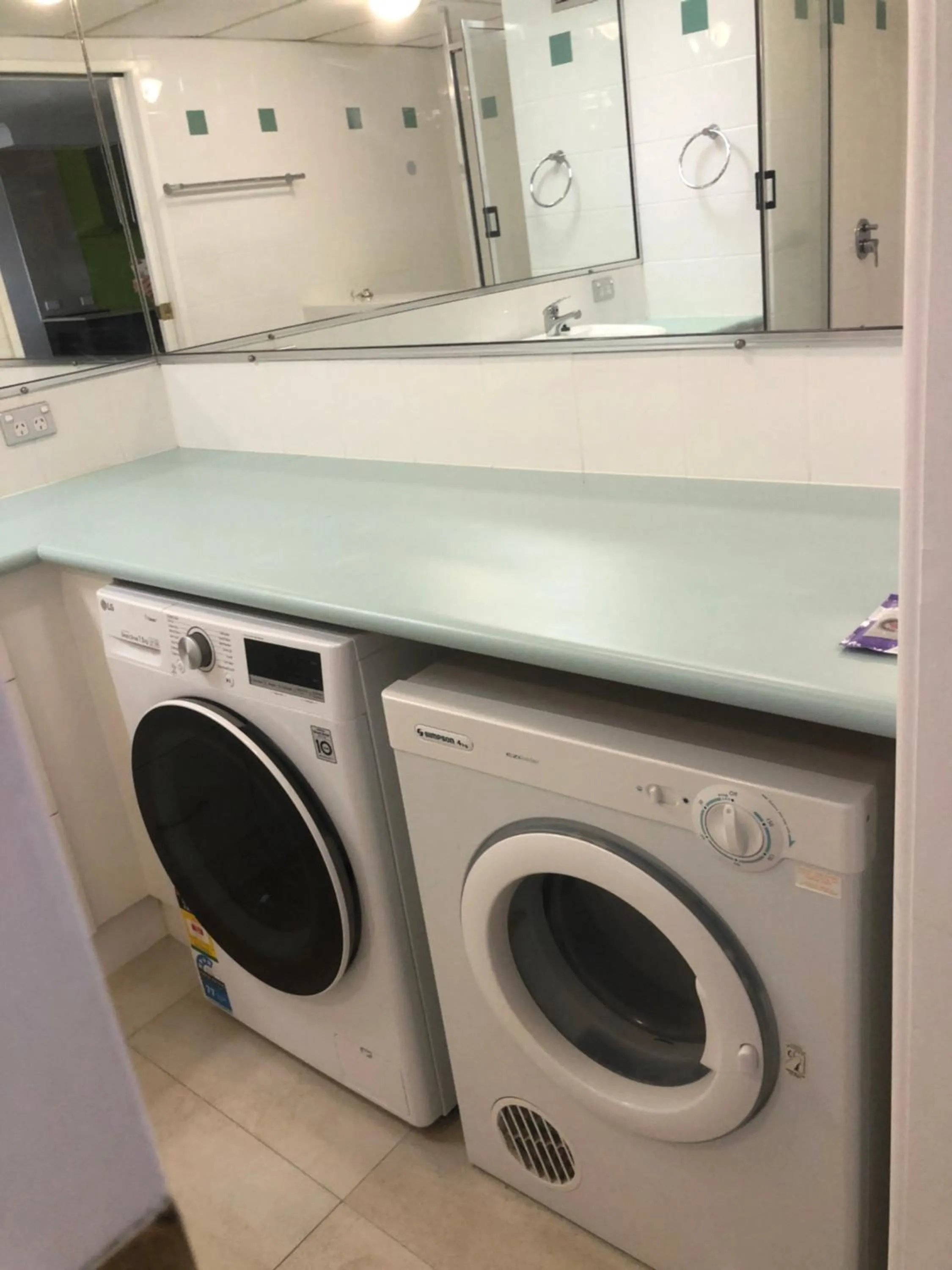 washing machine in Coral Towers Holiday Suites