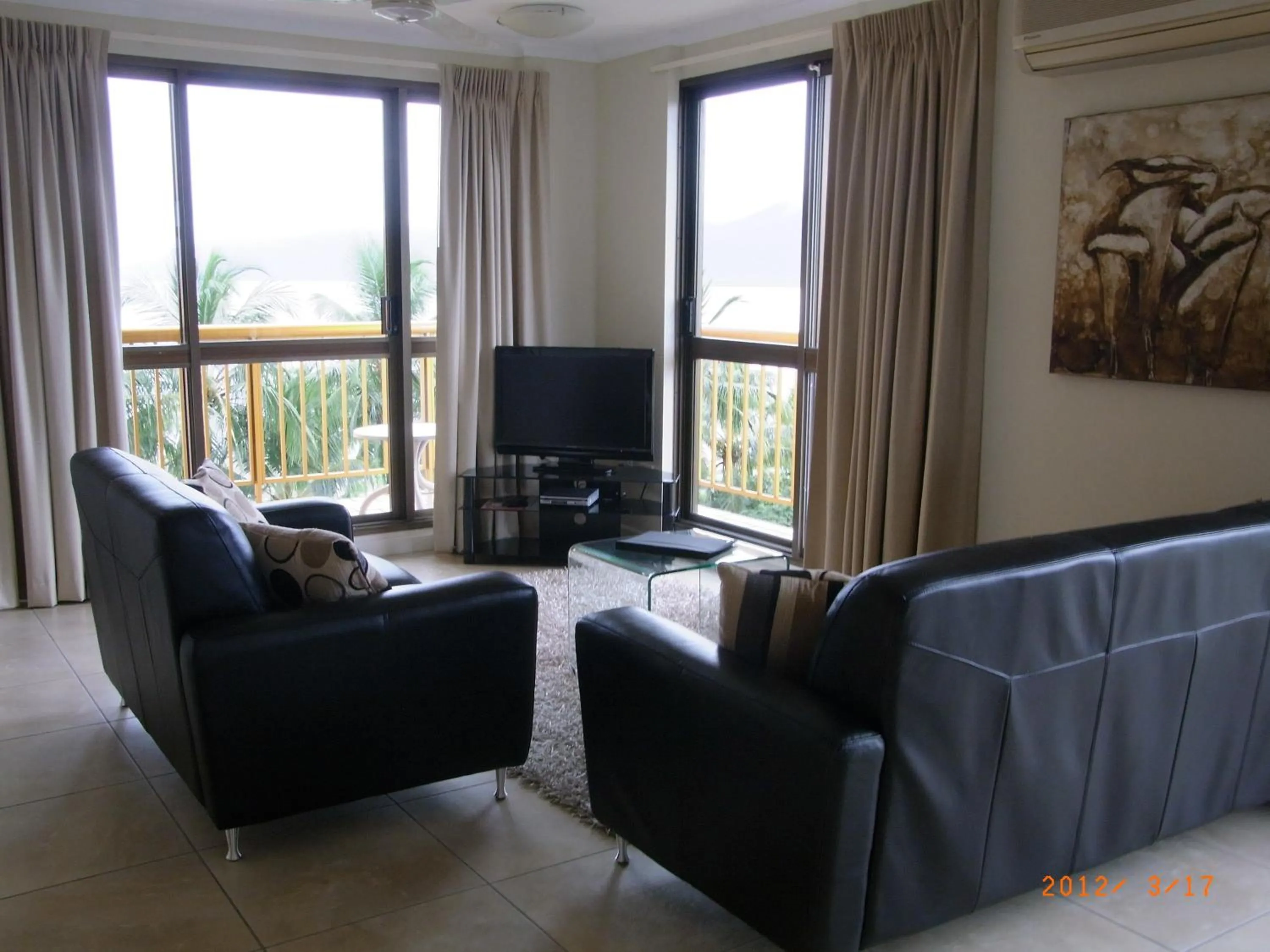 Seating area in Coral Towers Holiday Suites