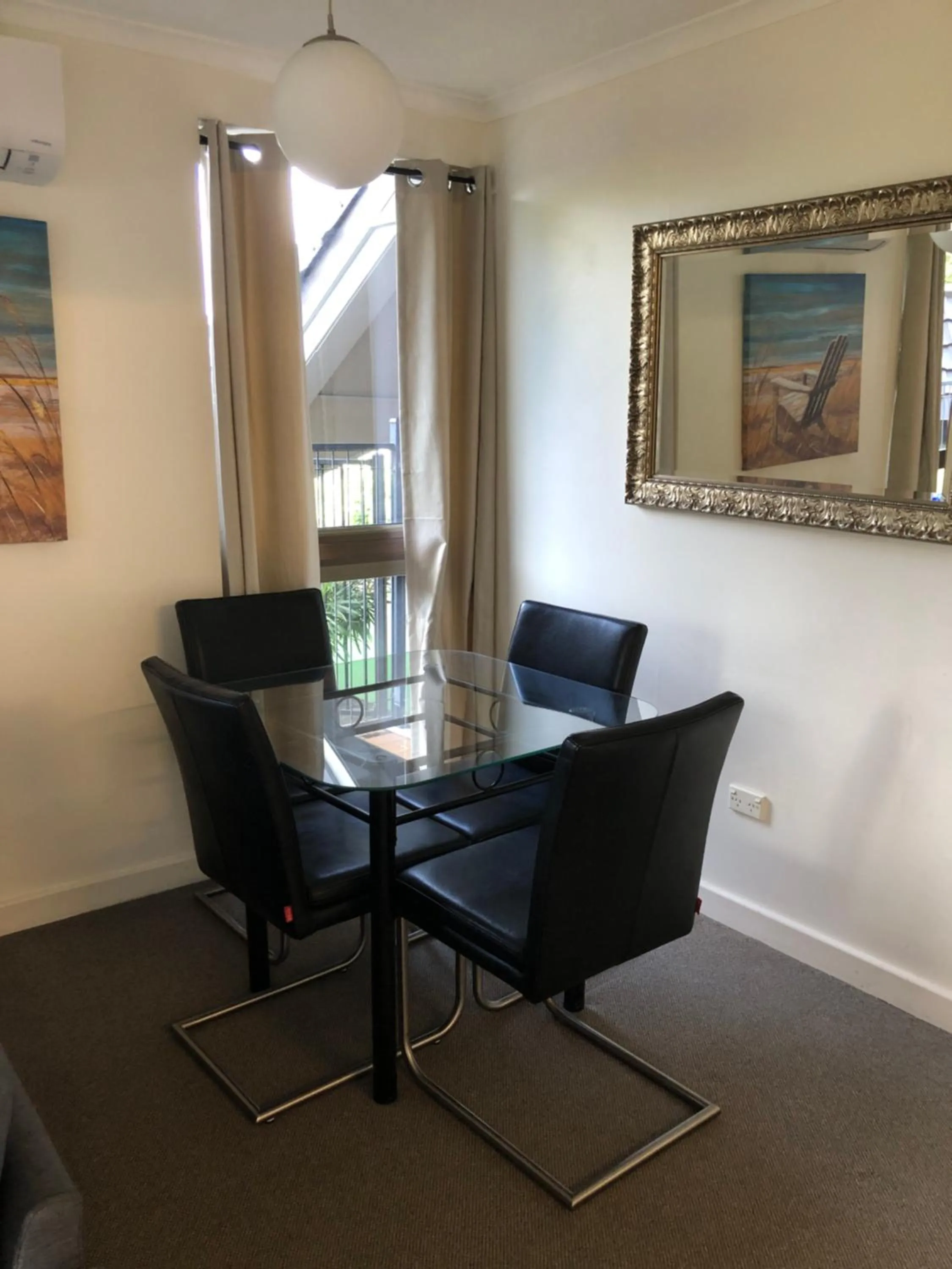 Dining area in Coral Towers Holiday Suites