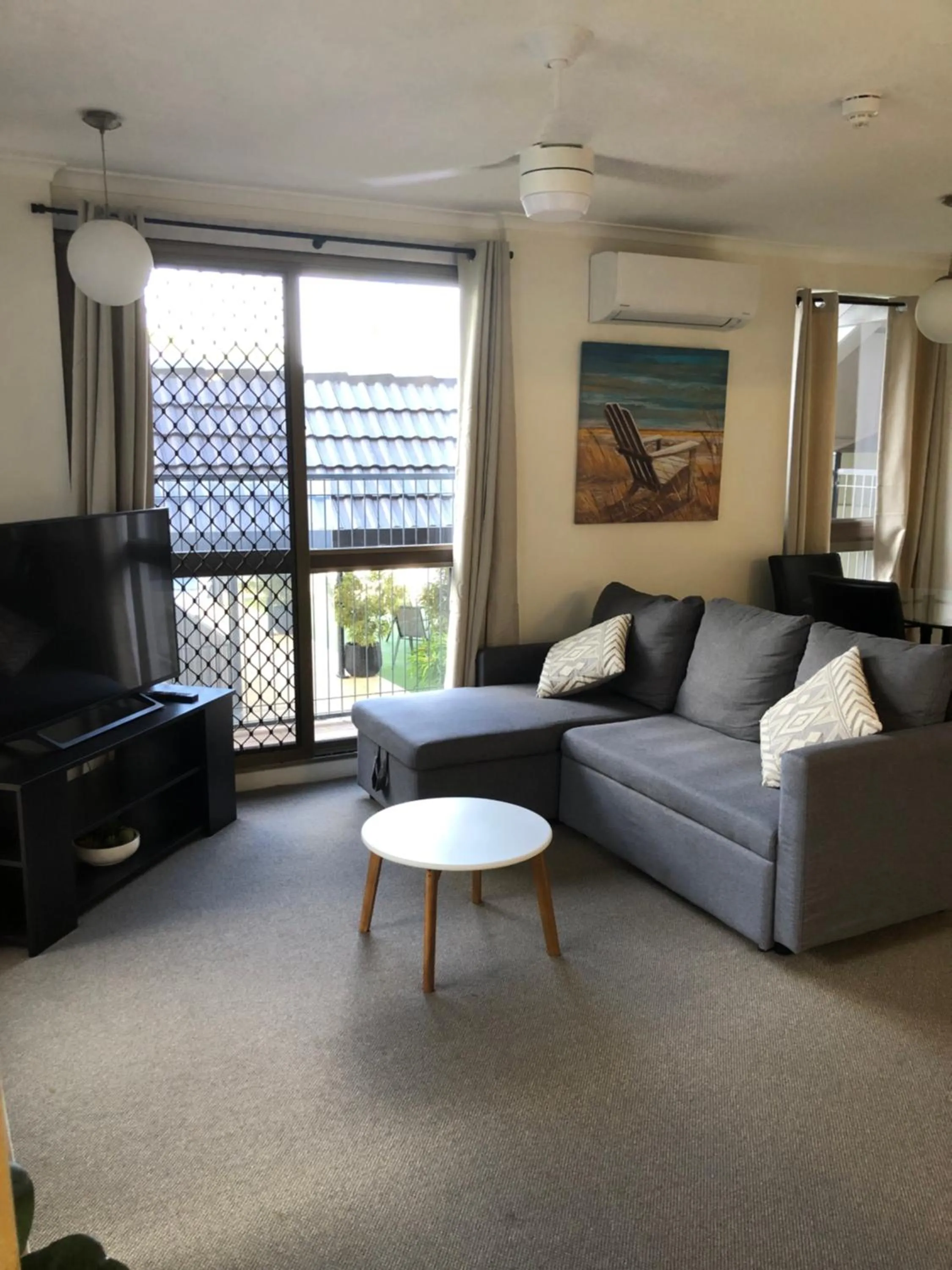 Living room in Coral Towers Holiday Suites