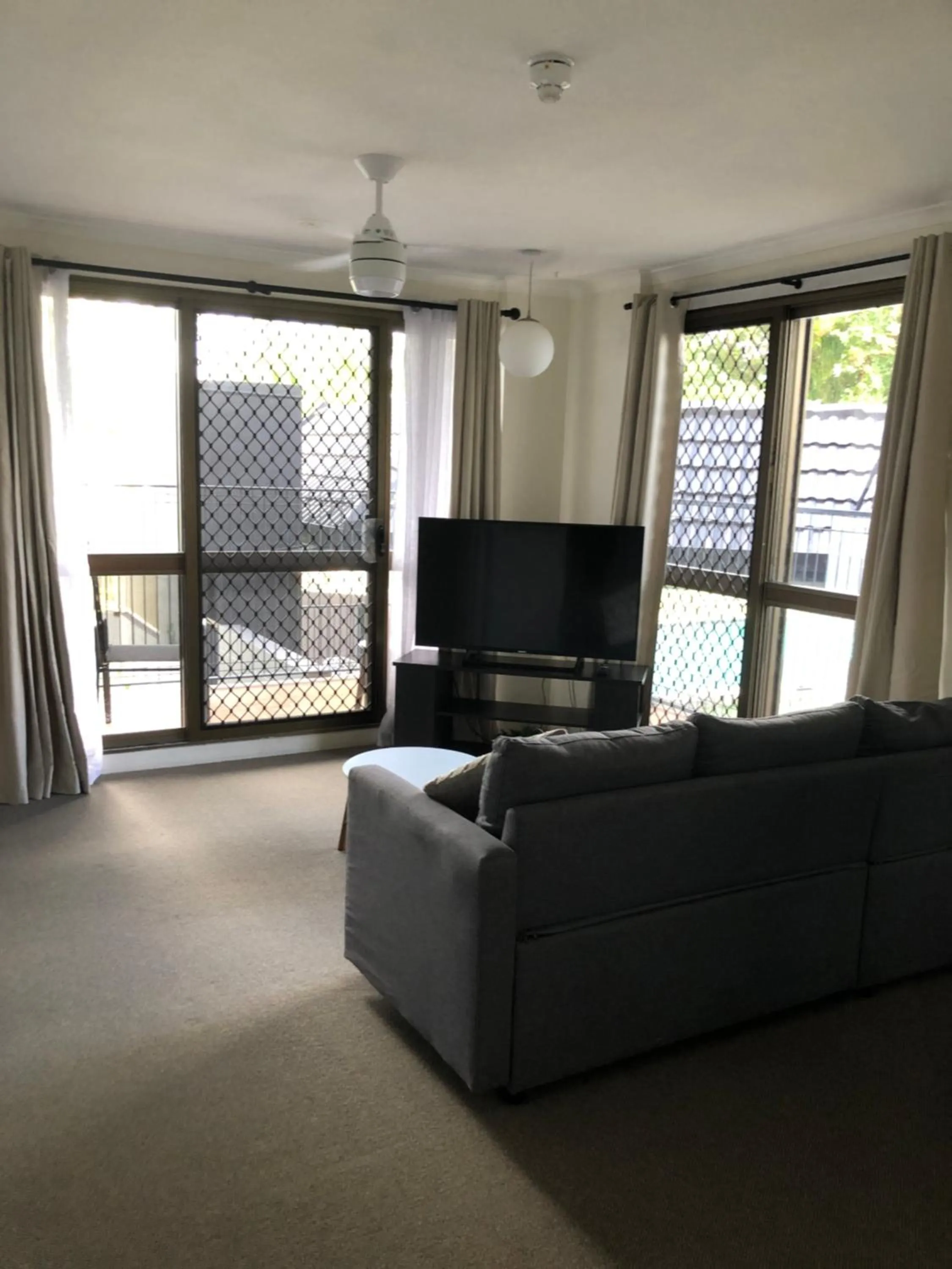 Living room in Coral Towers Holiday Suites