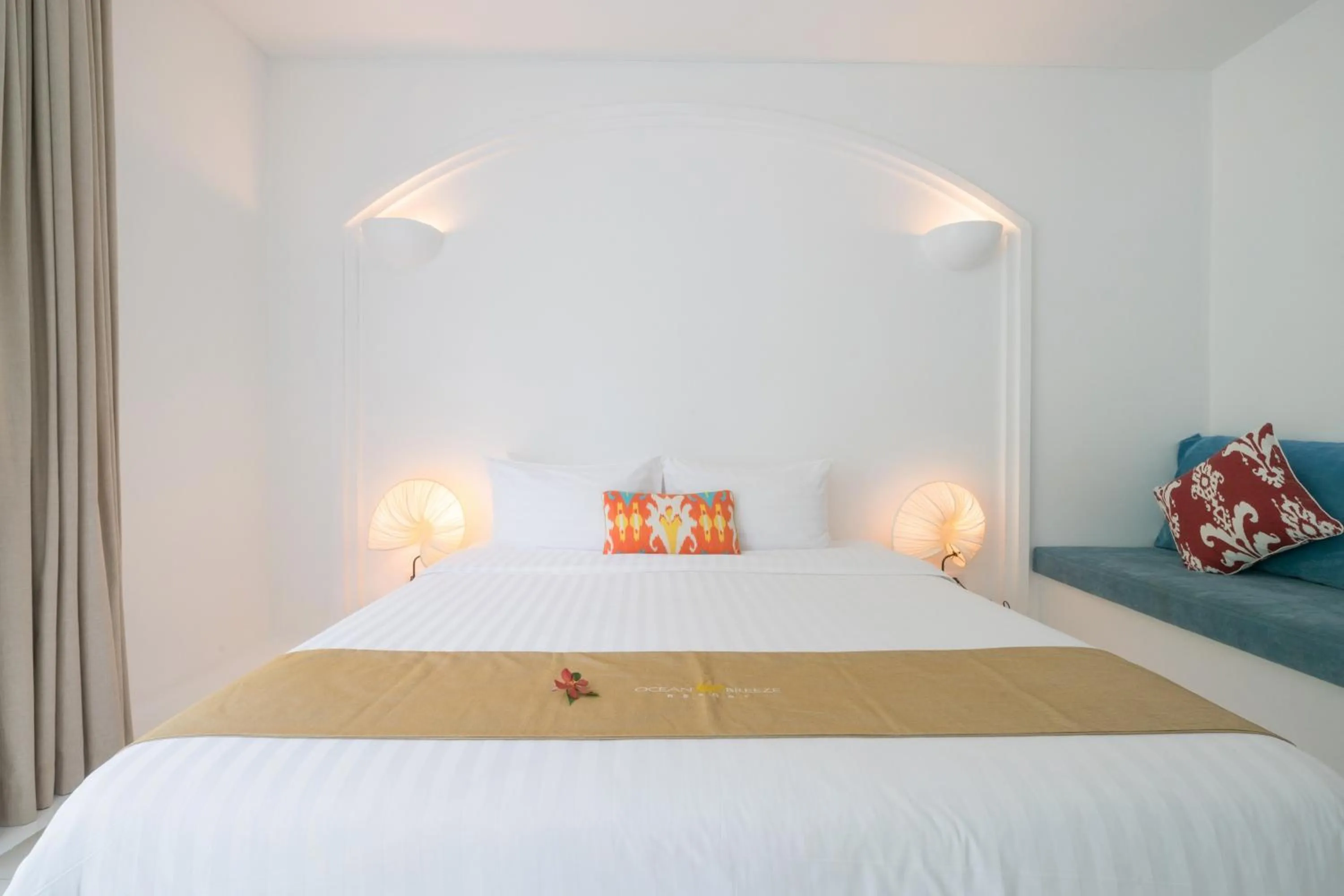 Bed in Ocean Breeze Resort Khaolak