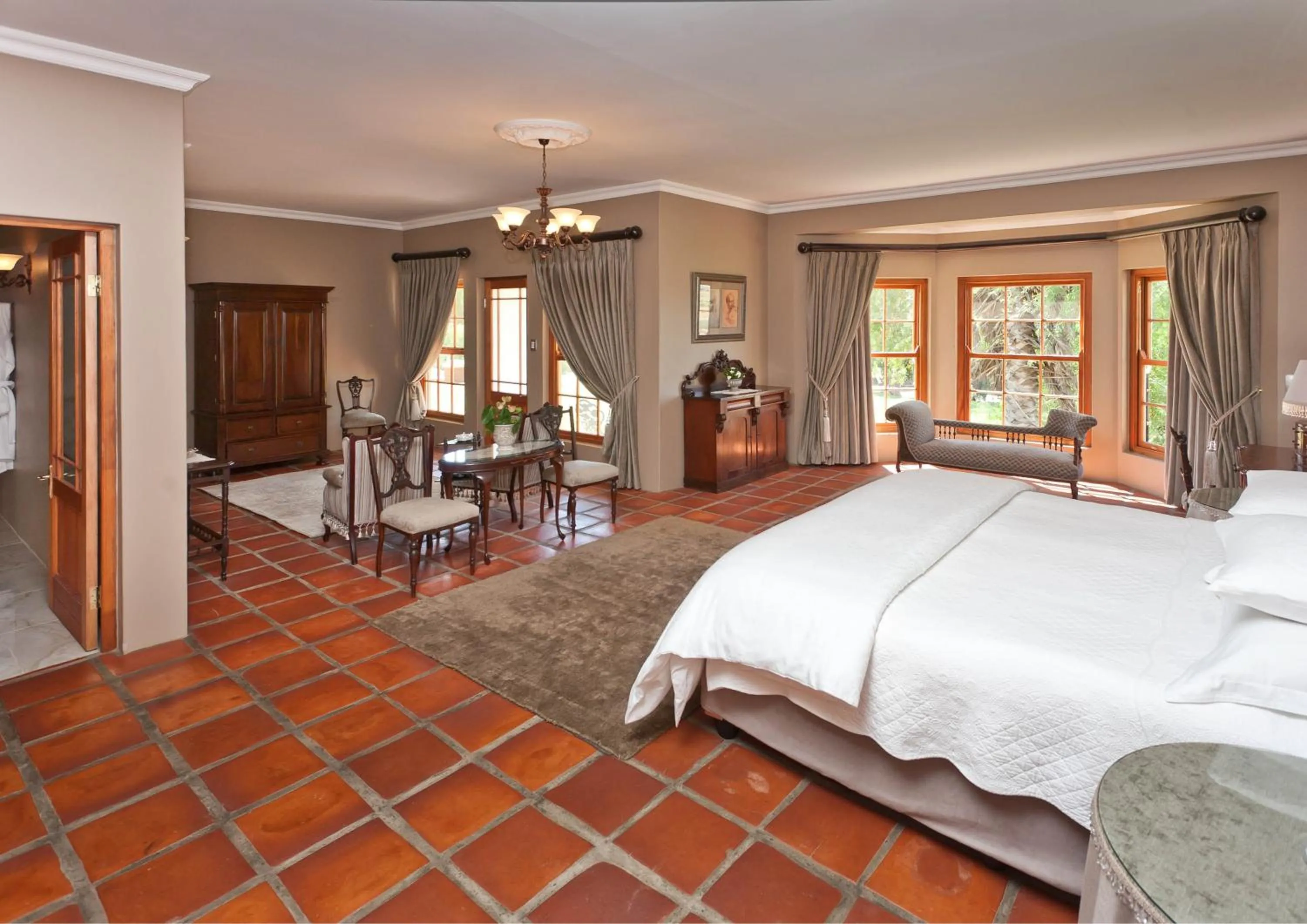 Seating area, Bed in La Plume Boutique Hotel & Spa