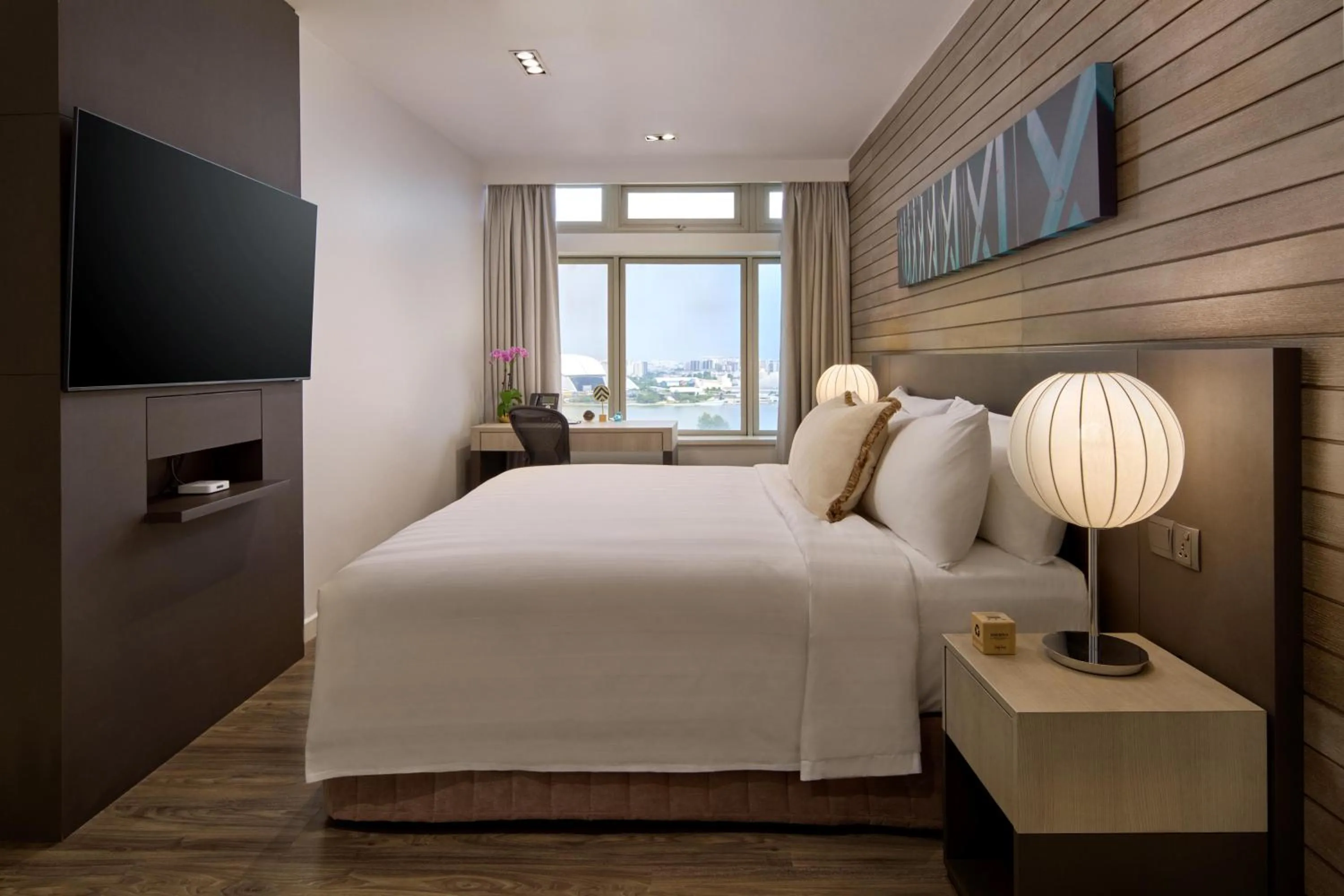 Bed in PARKROYAL Serviced Suites Singapore