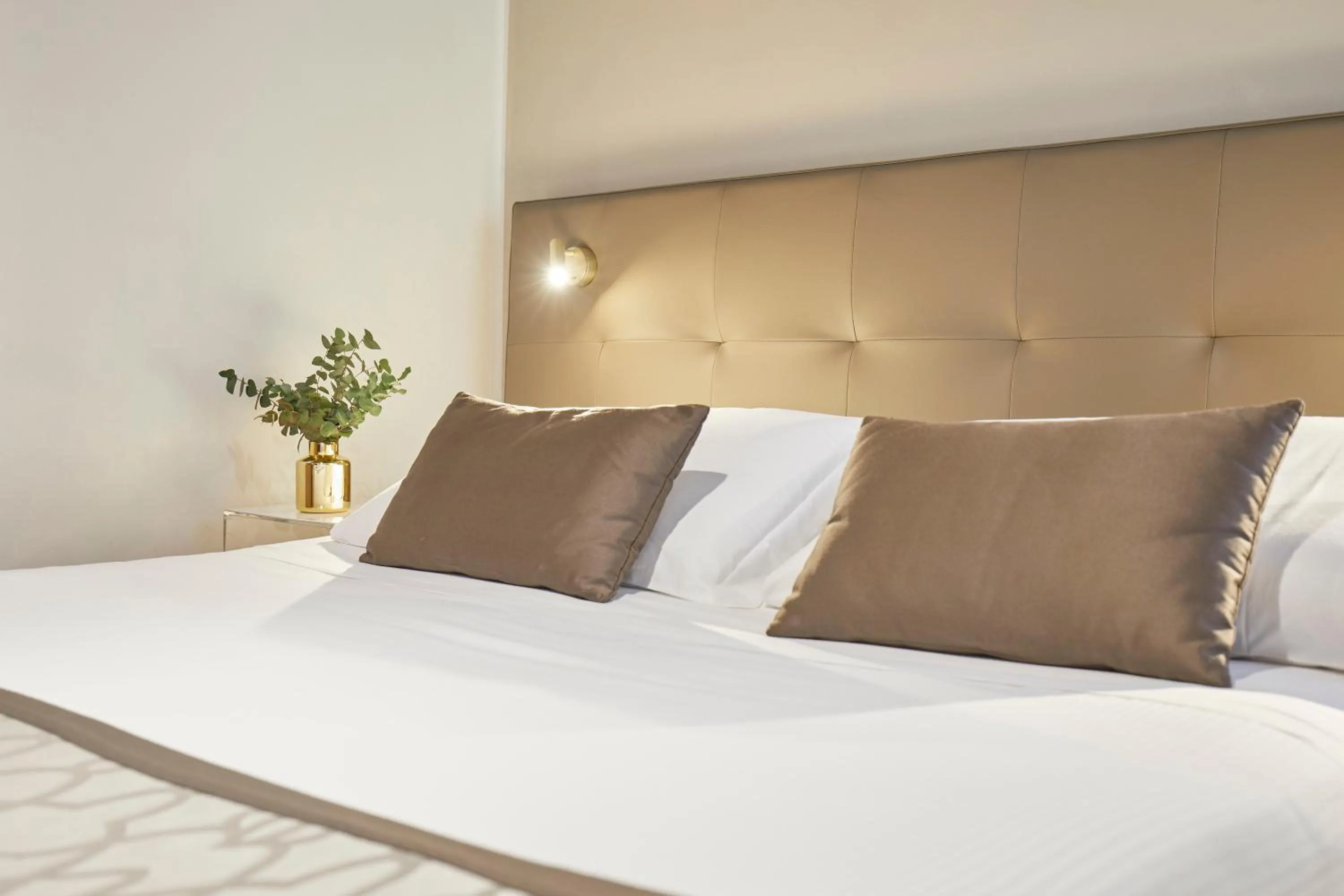 Bed in Sette Angeli Rooms