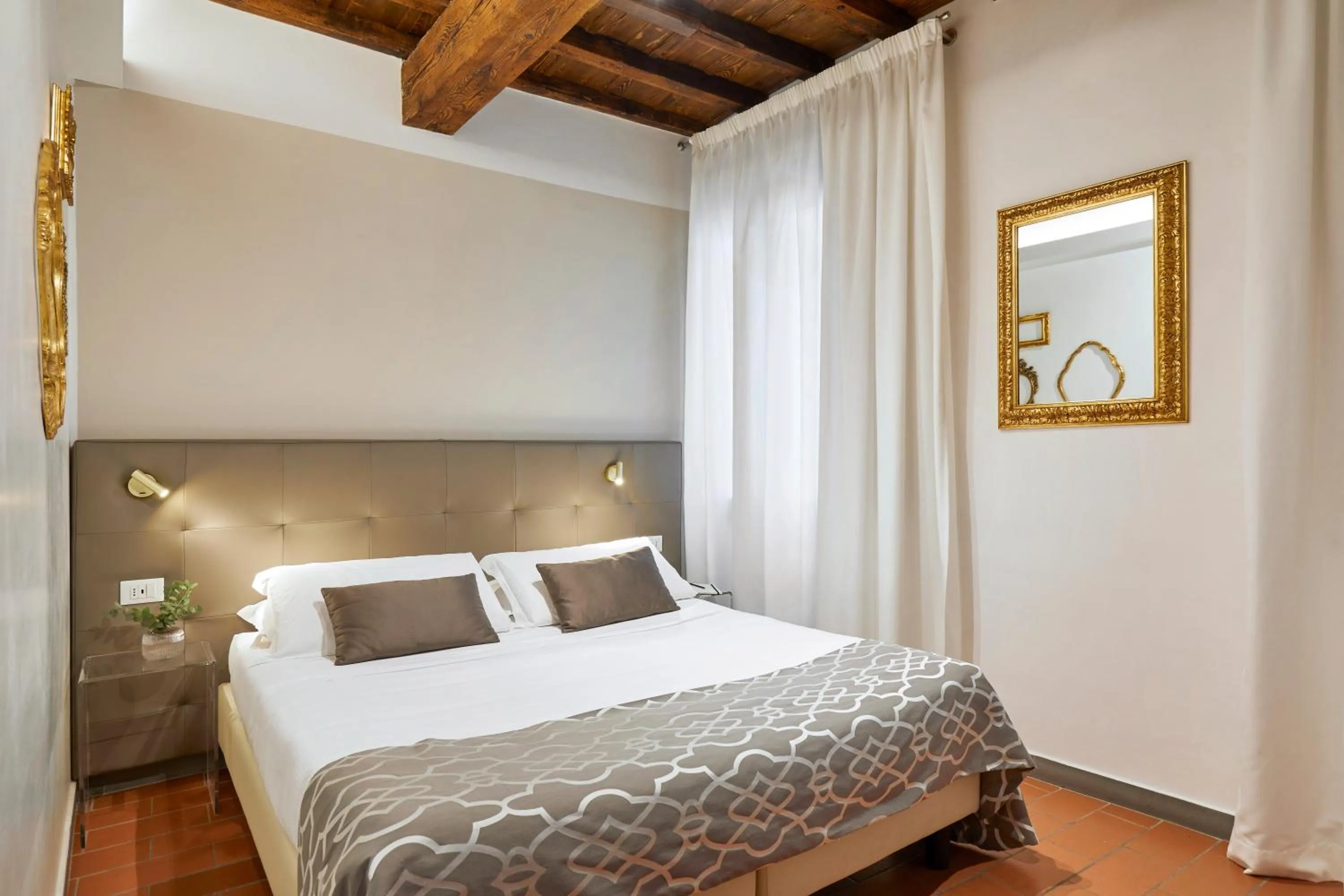 Bed in Sette Angeli Rooms