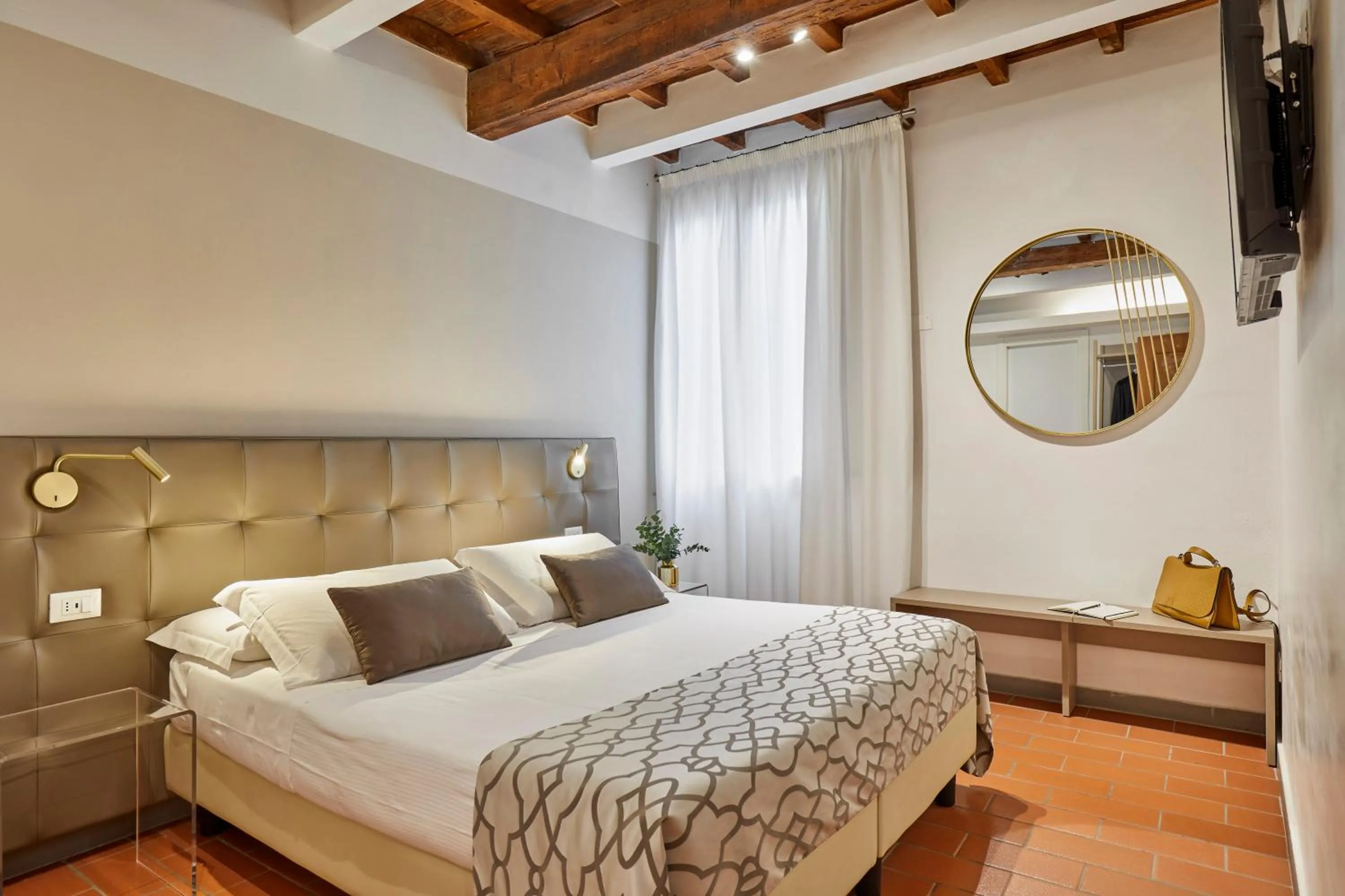 Bed in Sette Angeli Rooms