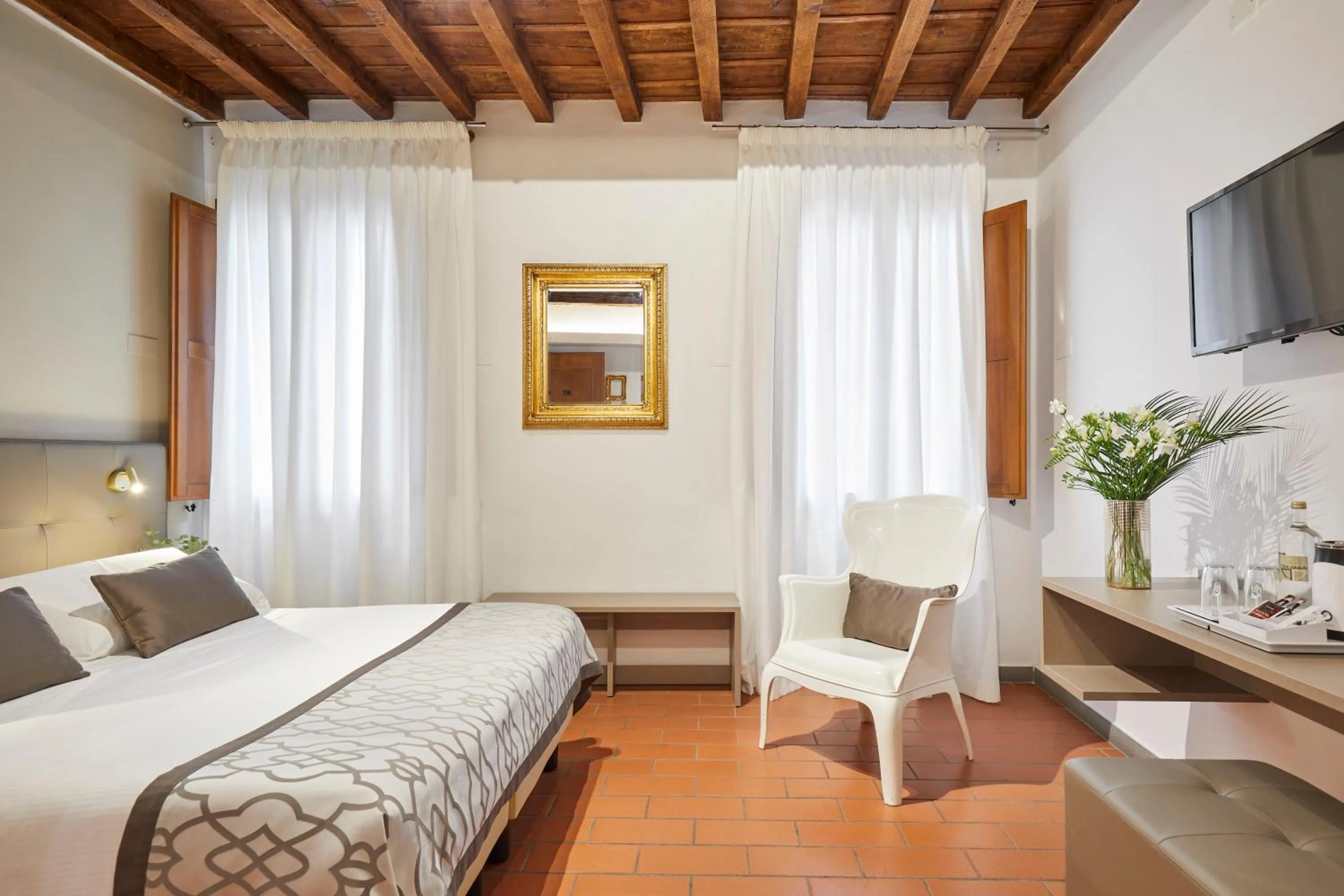 Bed in Sette Angeli Rooms