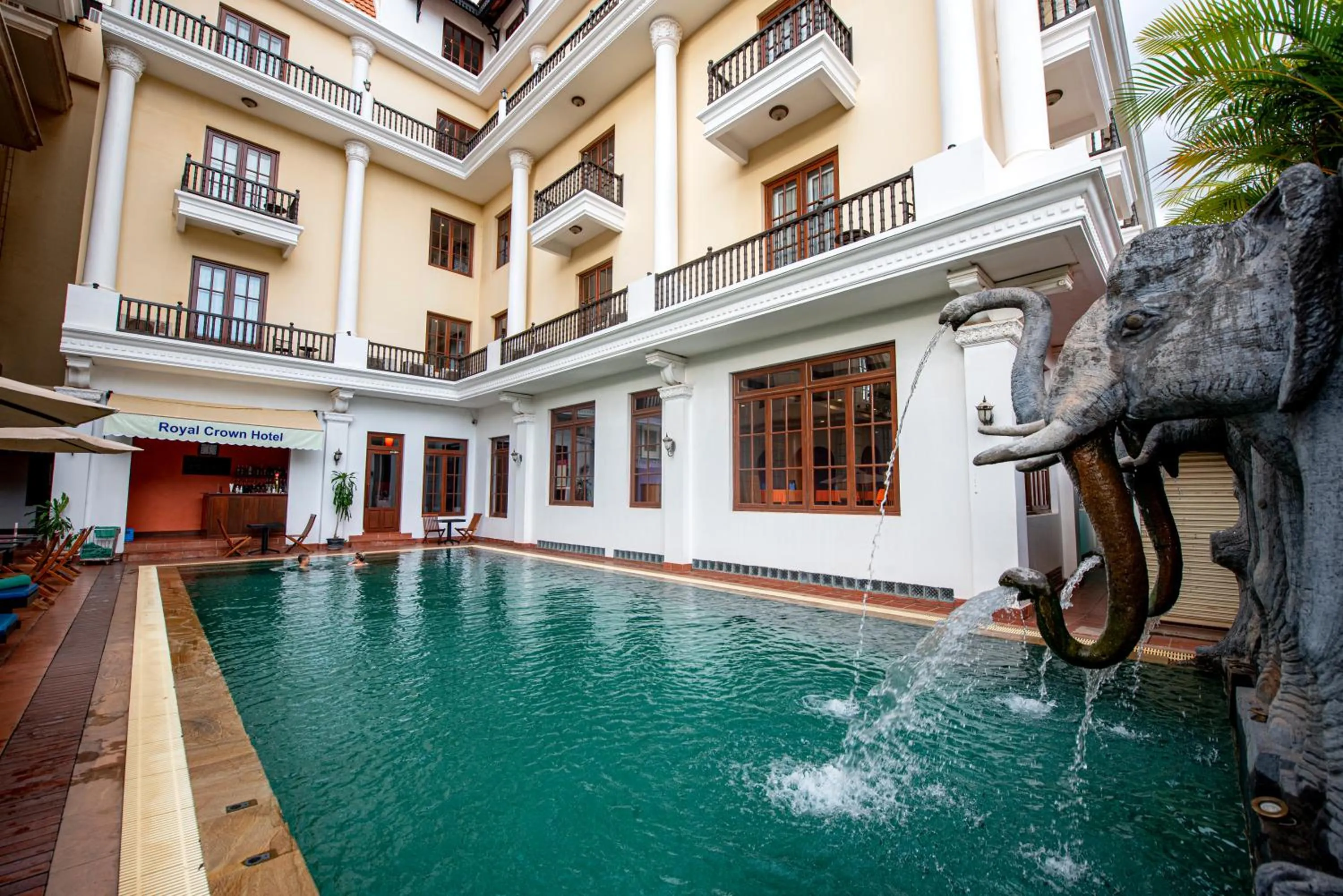 Swimming pool in The Suite By Royal Crown Hotel