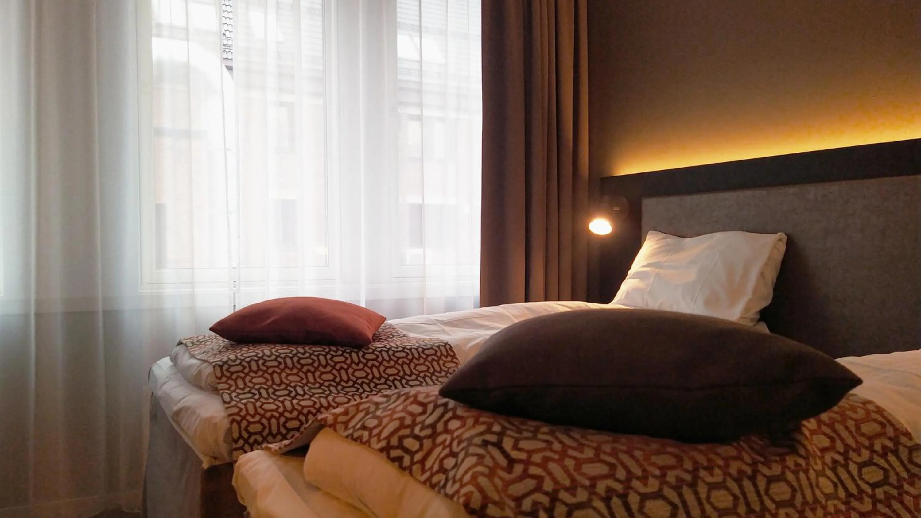 Bed in Quality Hotel Augustin