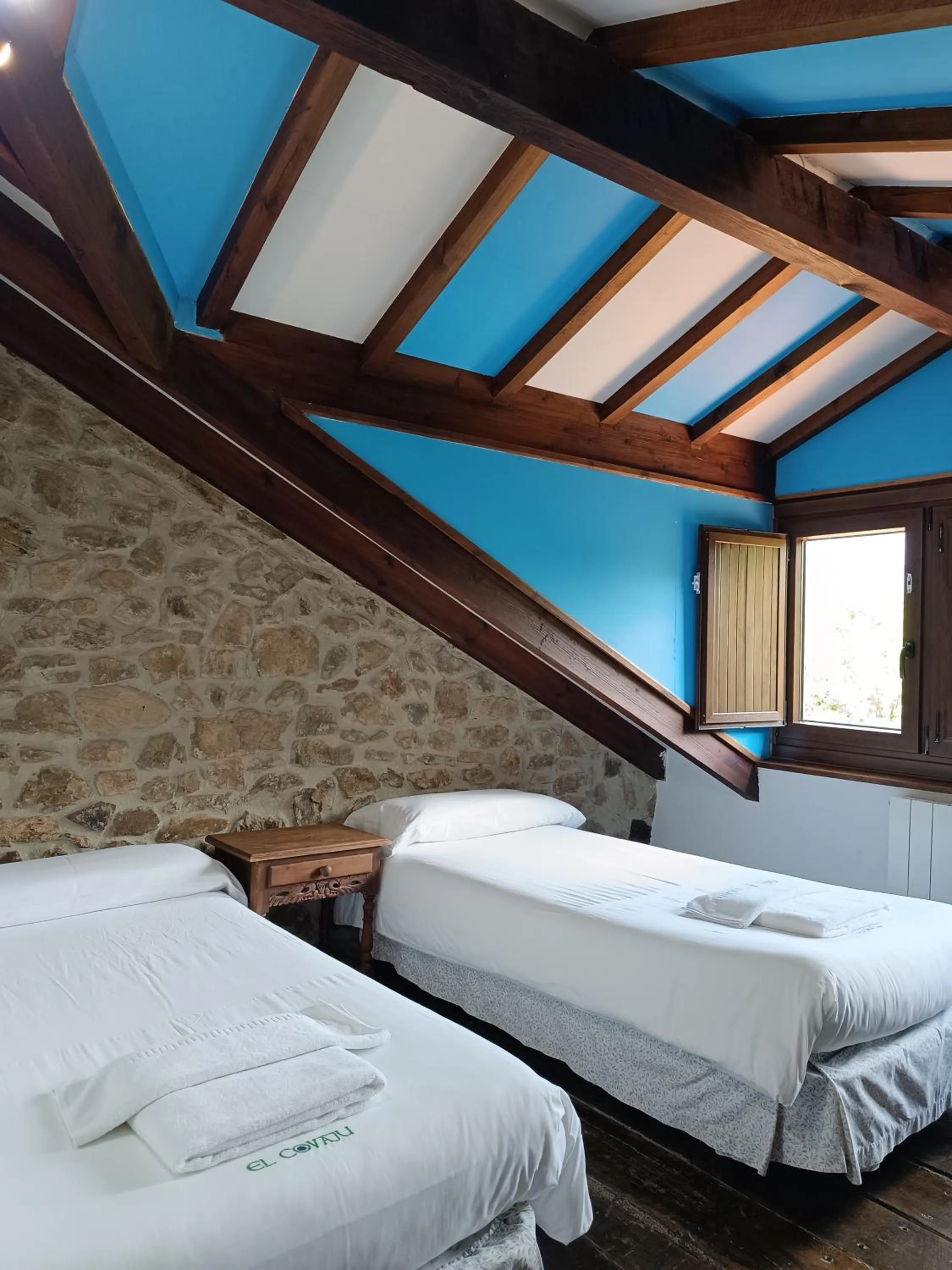 Bedroom, Bed in Viviendas Rurales El Covaju