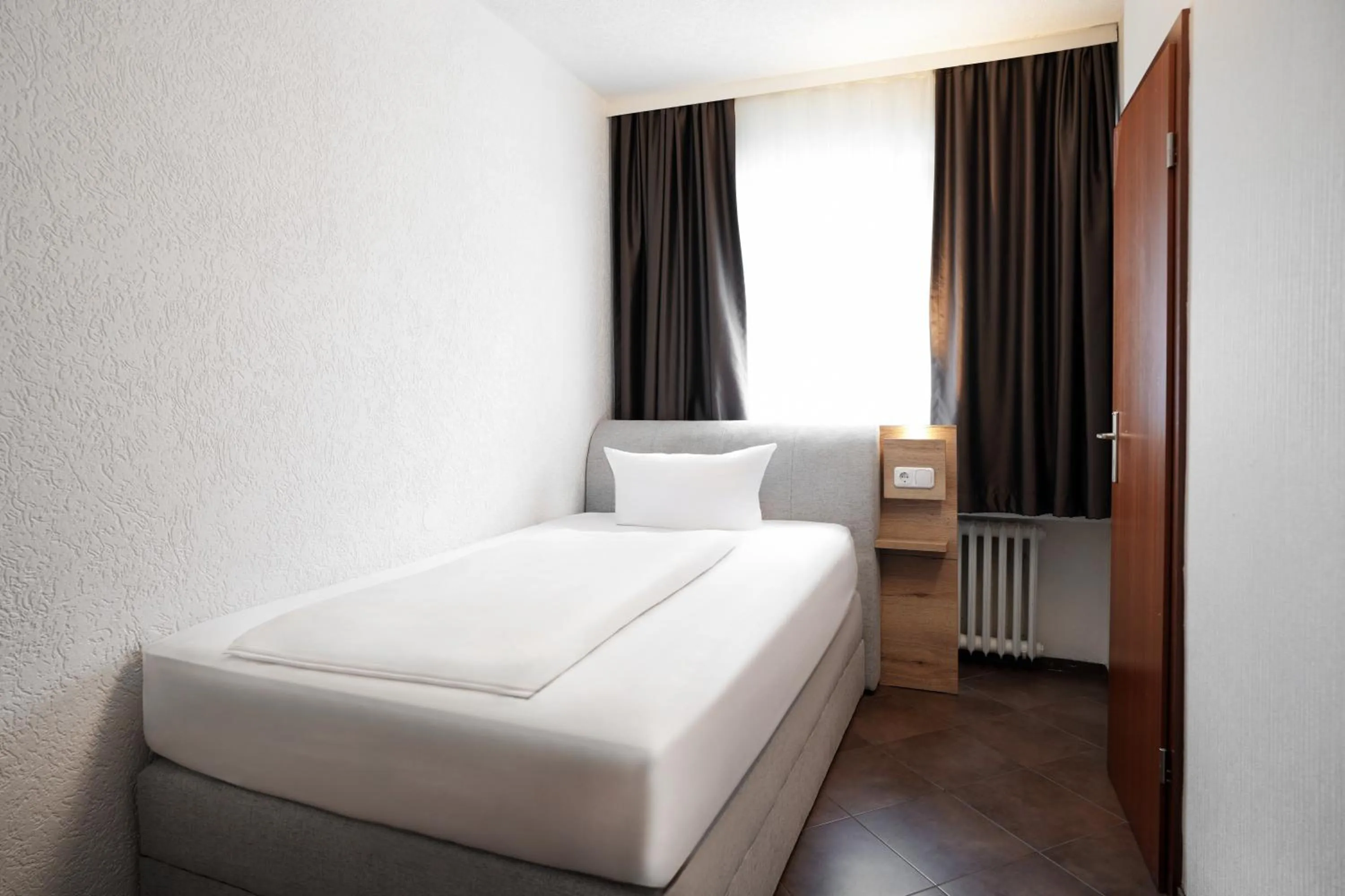 Bed in Hotel Frohnhauser Hof