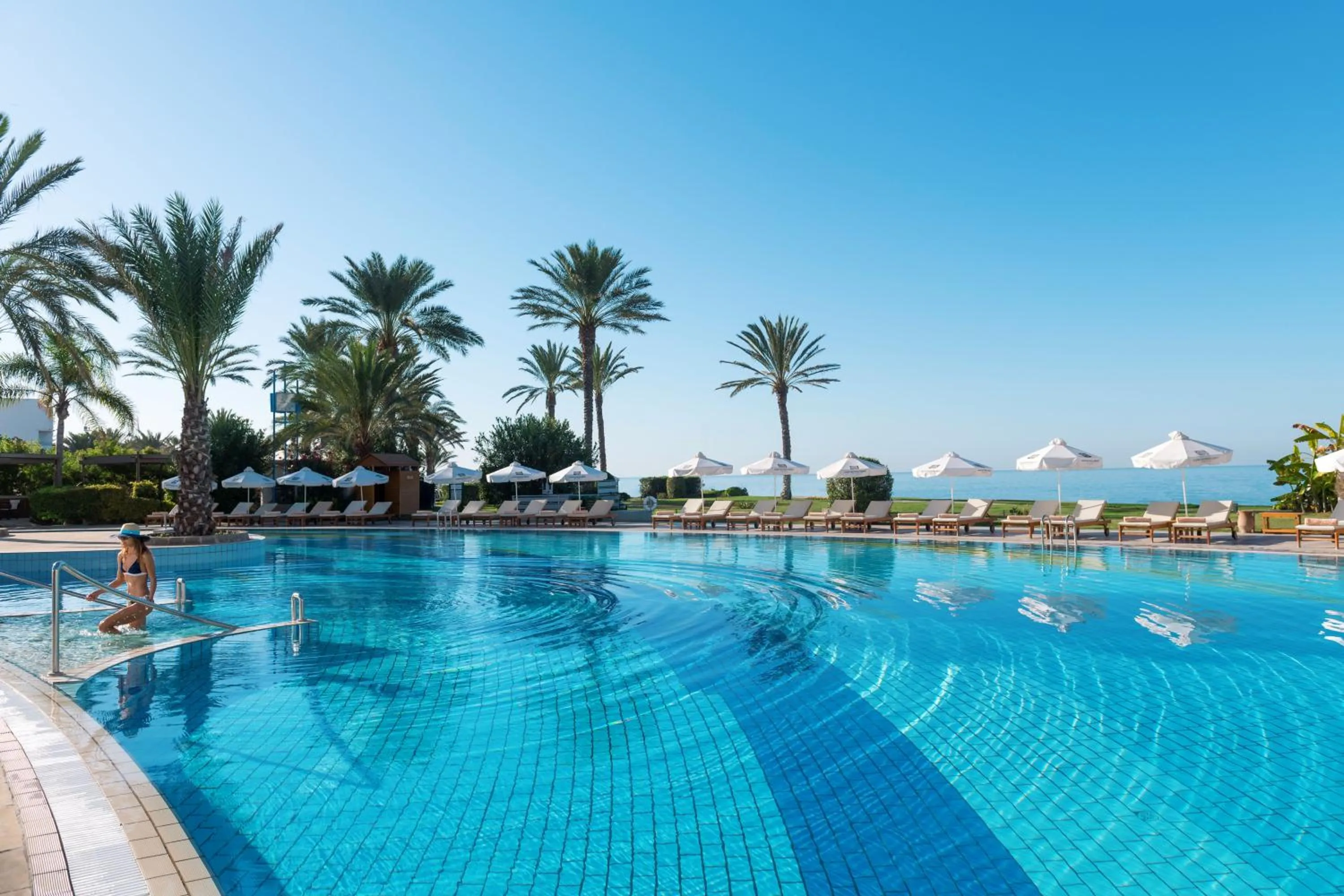 Swimming pool in Constantinou Bros Athena Beach Hotel
