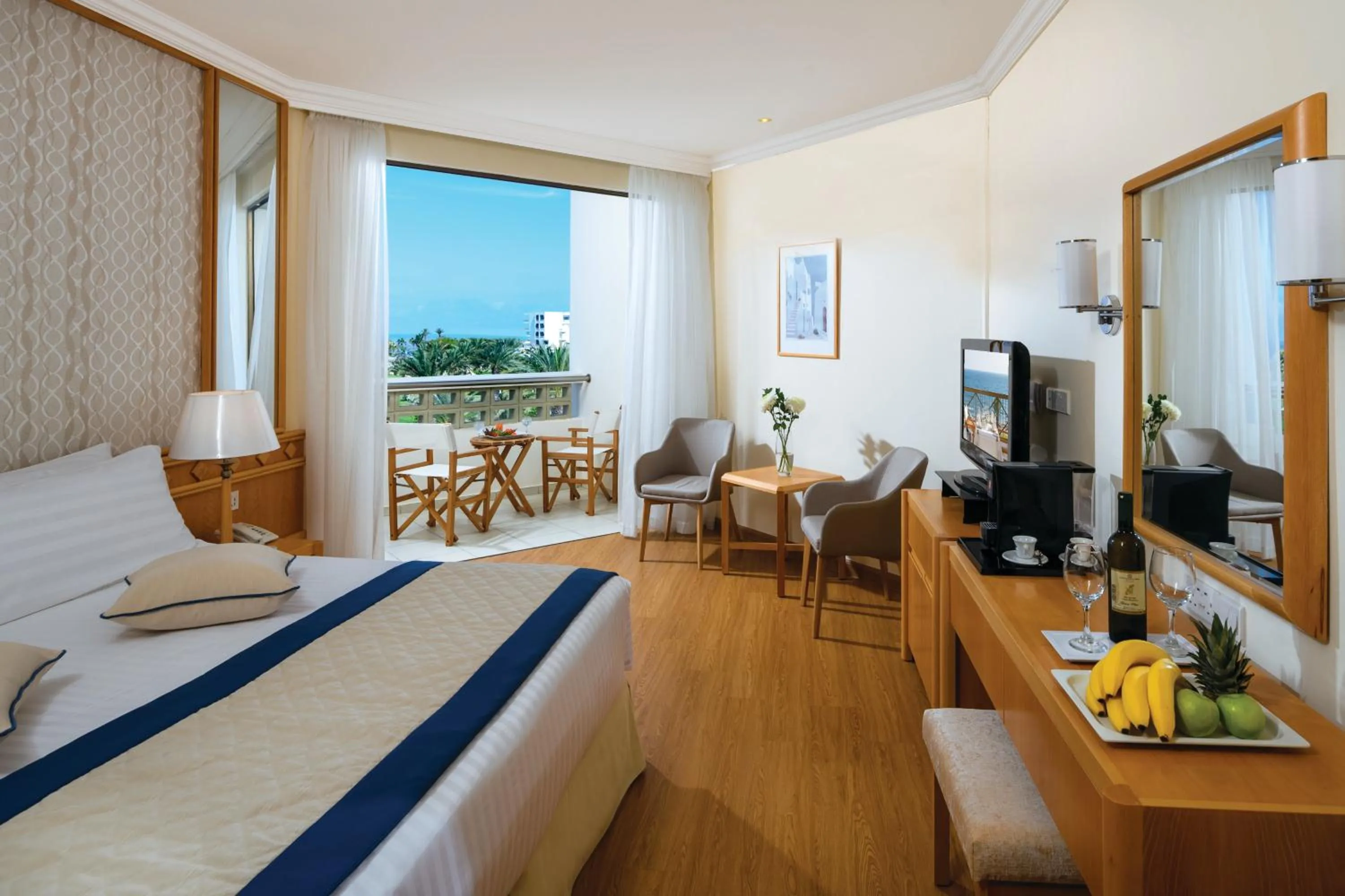 Family Triple Interconnecting Classic Room Limited Sea View in Constantinou Bros Athena Beach Hotel