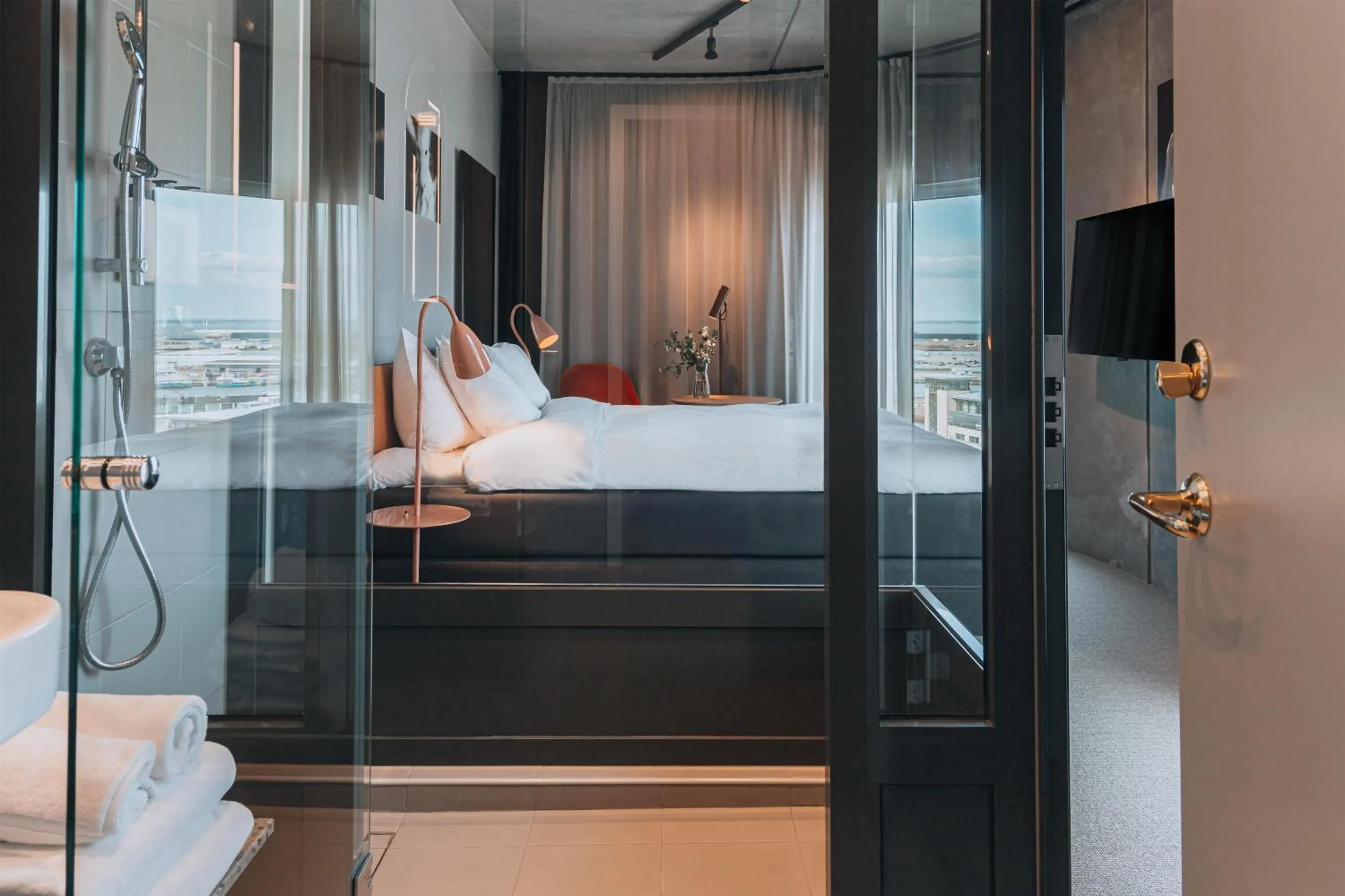 Bathroom, Bed in STORY HOTEL MALMO, in JdV by Hyatt