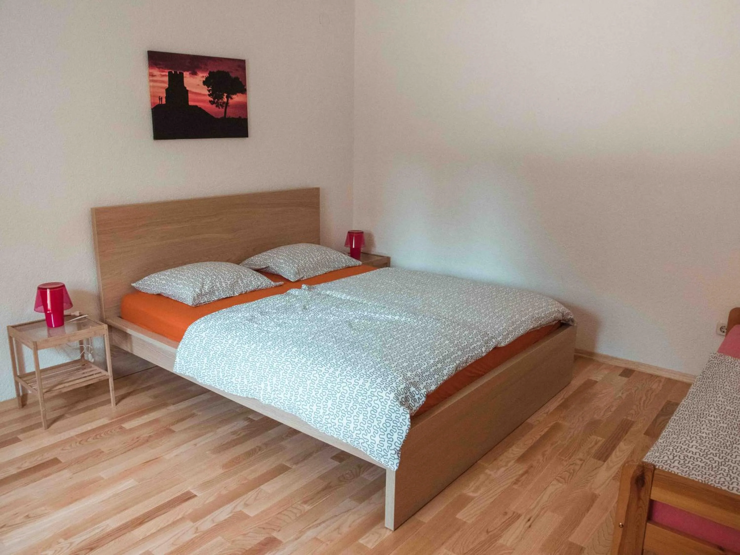 Bed in Apartments Yvonne