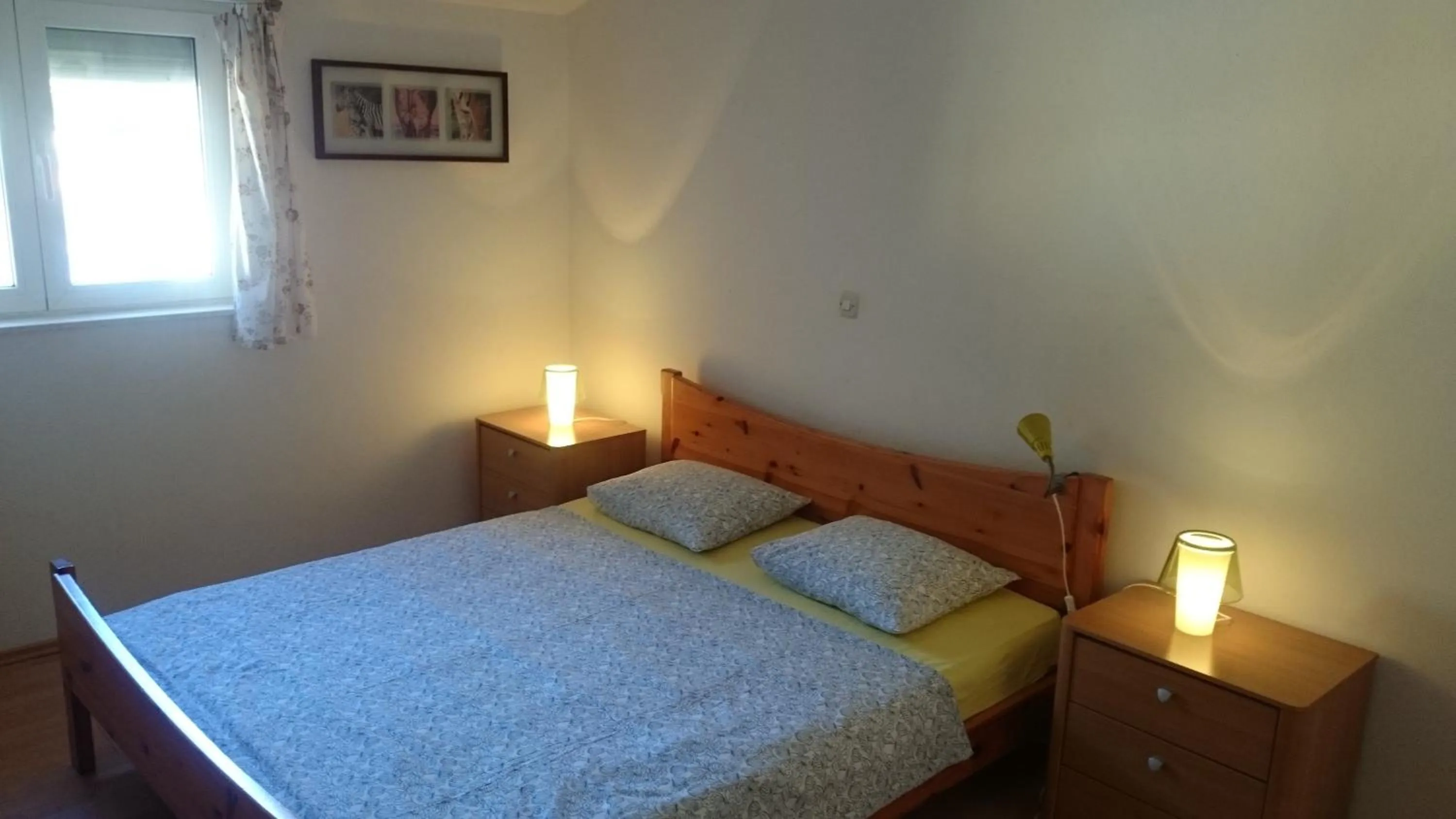 Bed in Apartments Yvonne