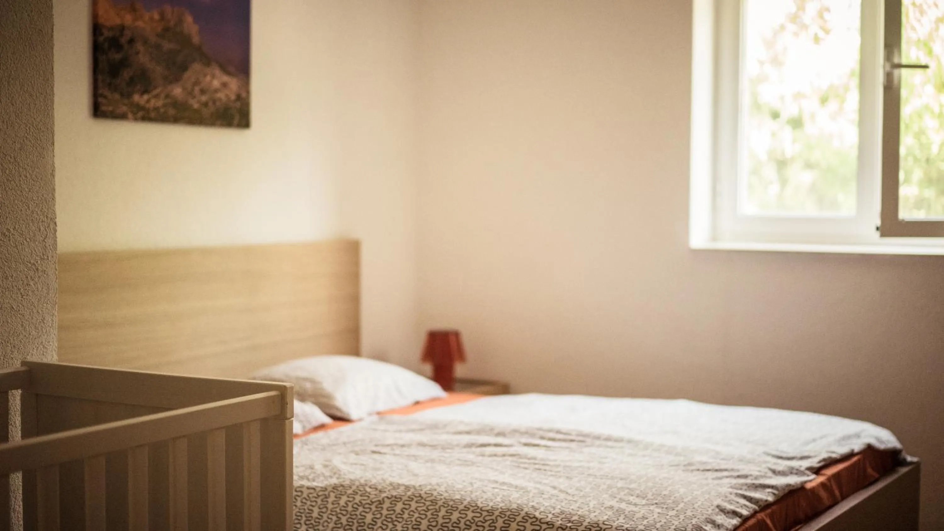 Bed in Apartments Yvonne