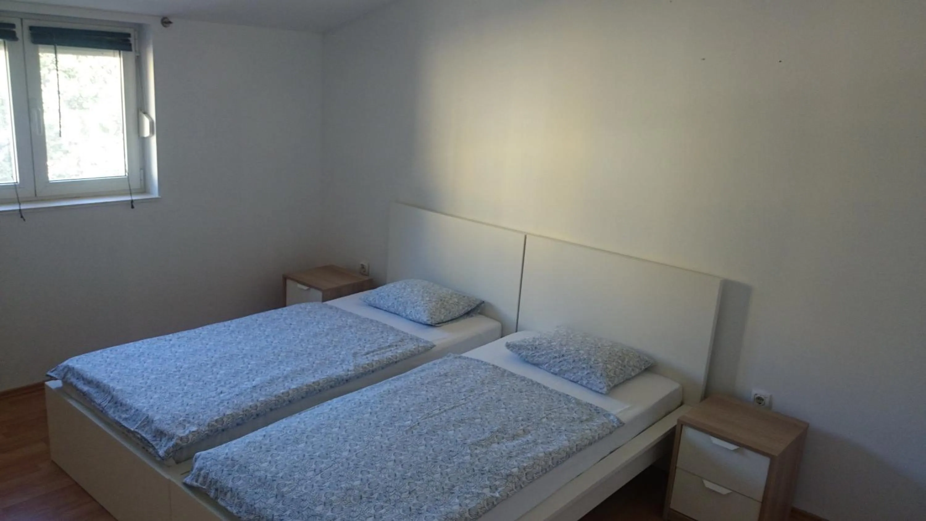 Bed in Apartments Yvonne