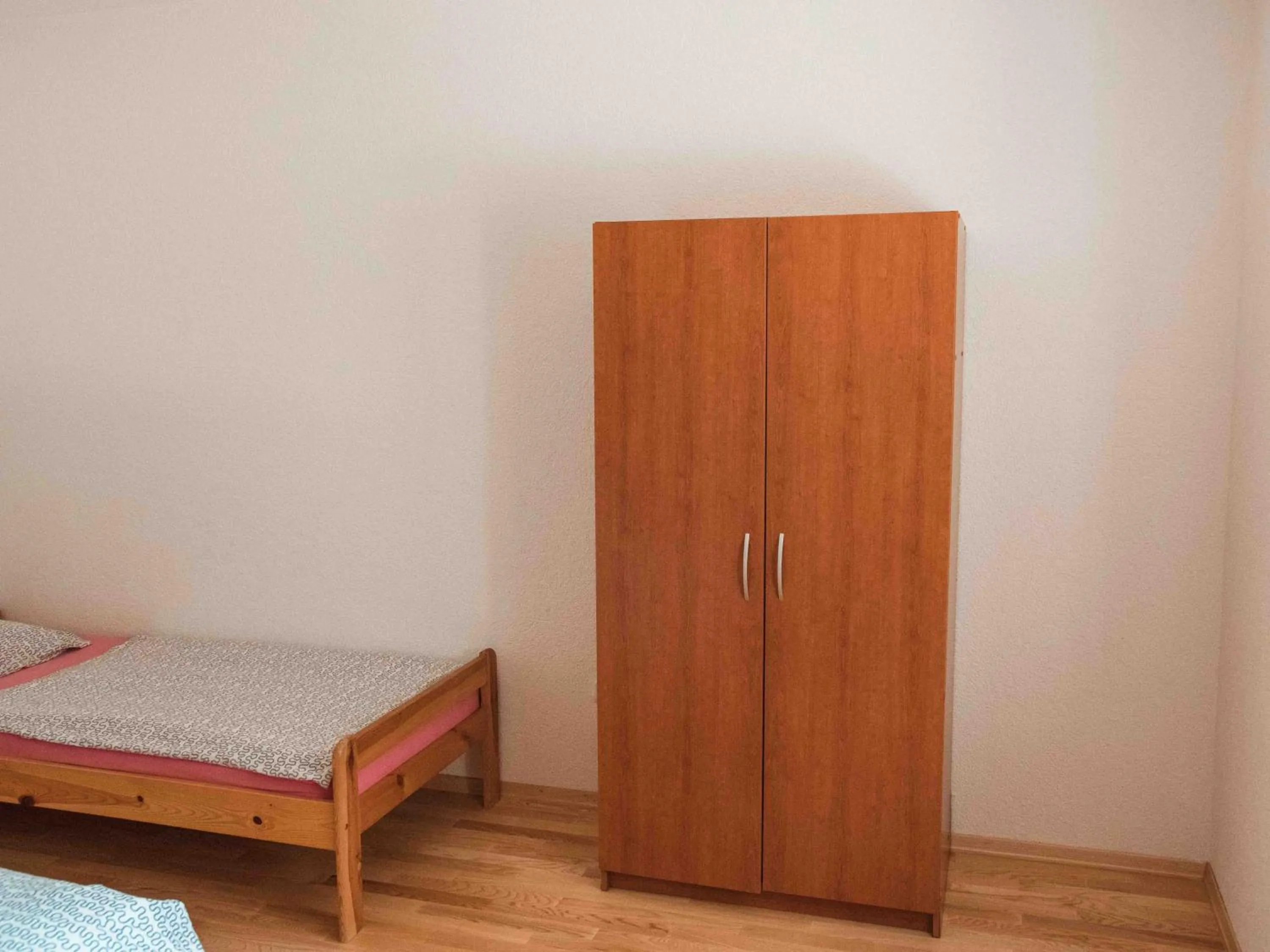 Bed in Apartments Yvonne