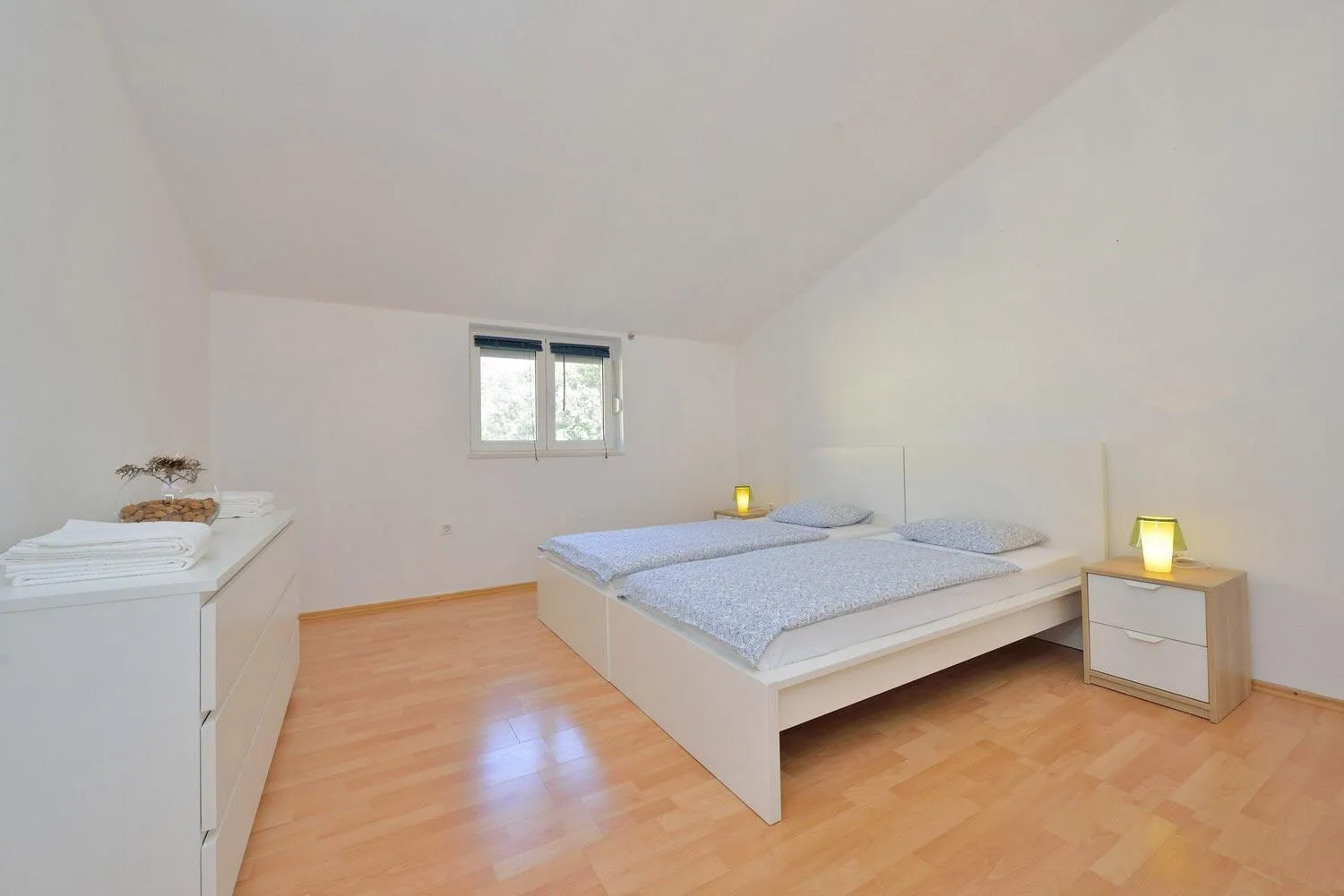 Bed in Apartments Yvonne