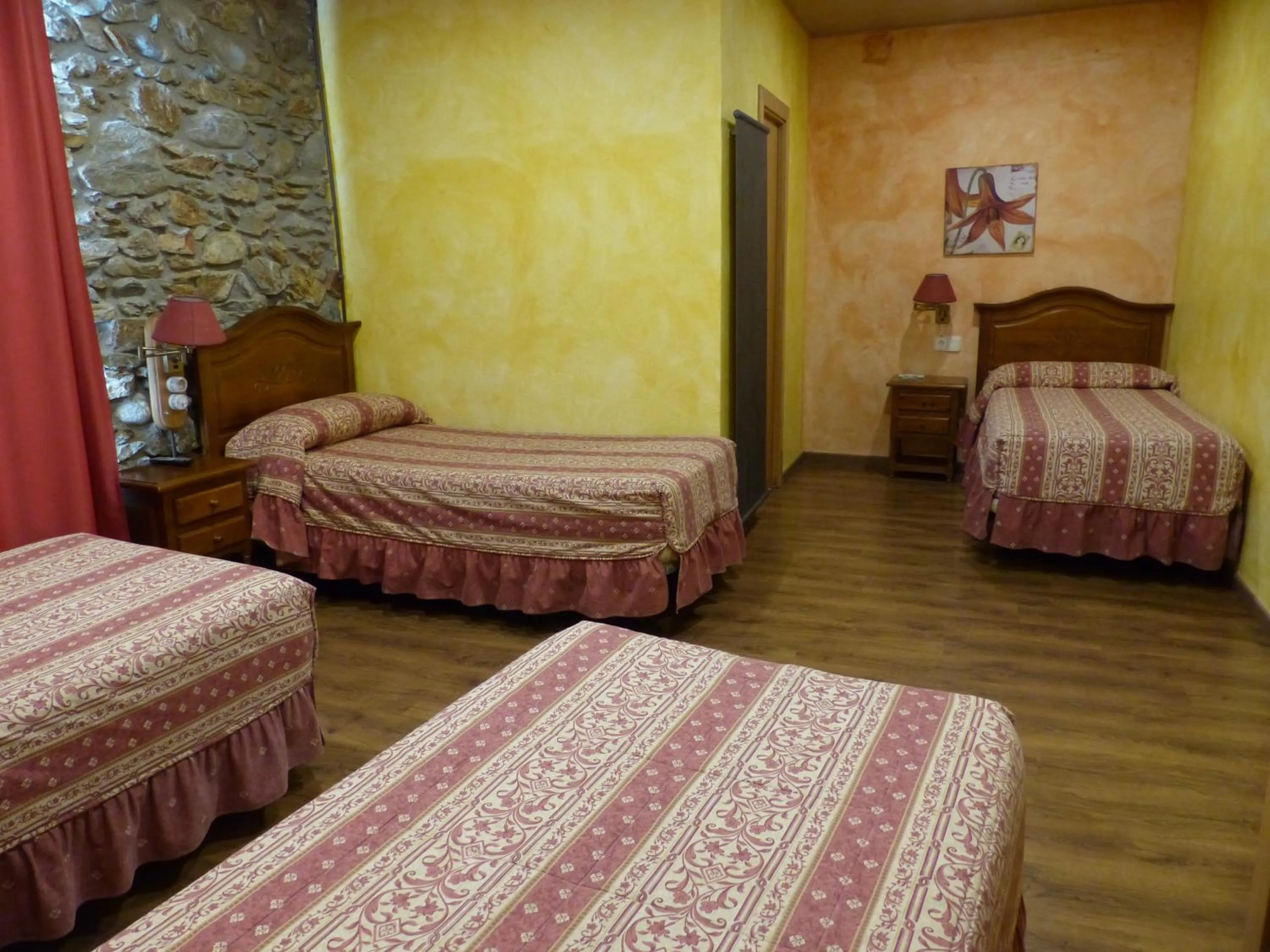 Bed in Hostal Vall D'Aneu by Arcas & Sambola