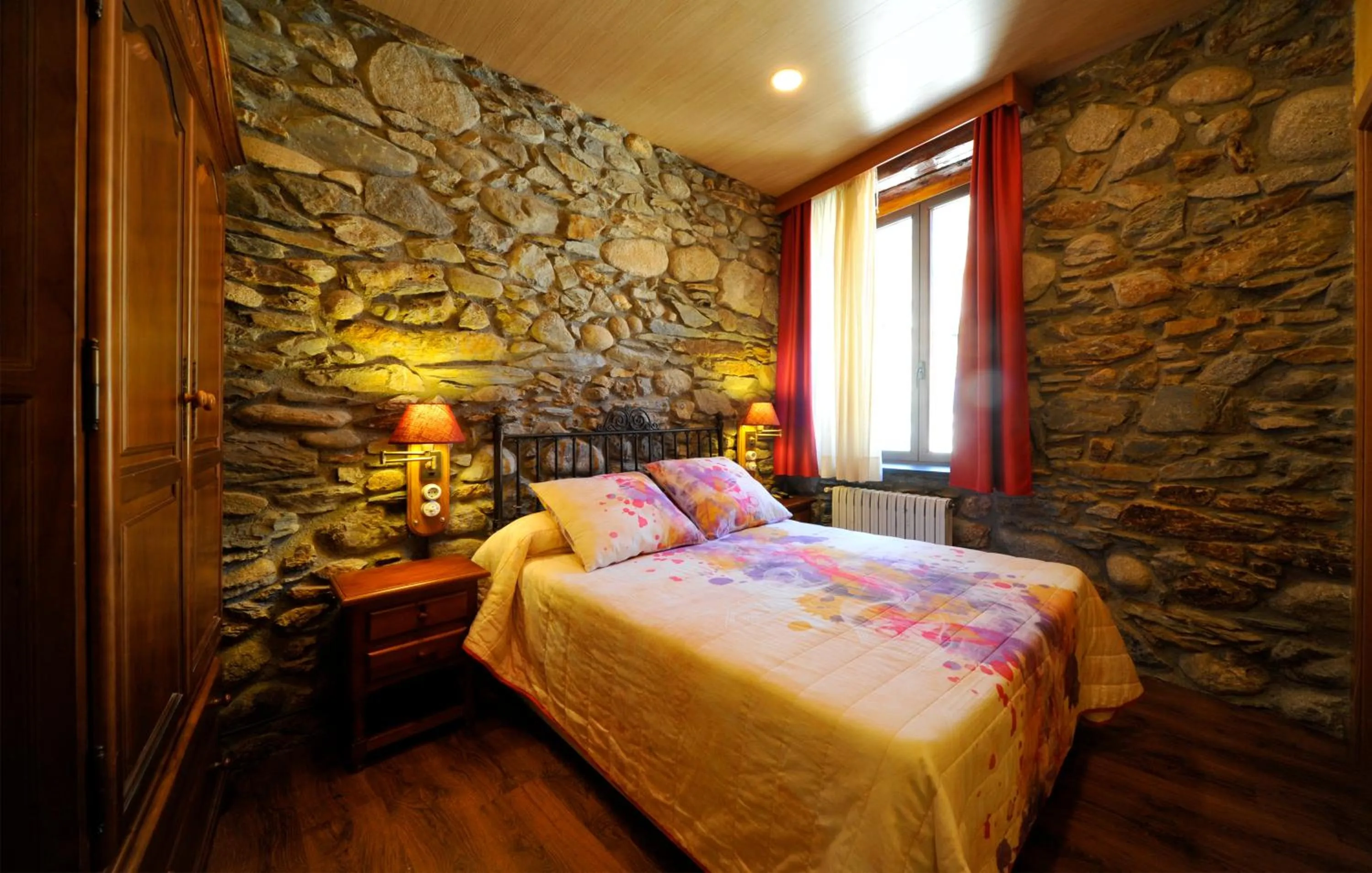Bed in Hostal Vall D'Aneu by Arcas & Sambola