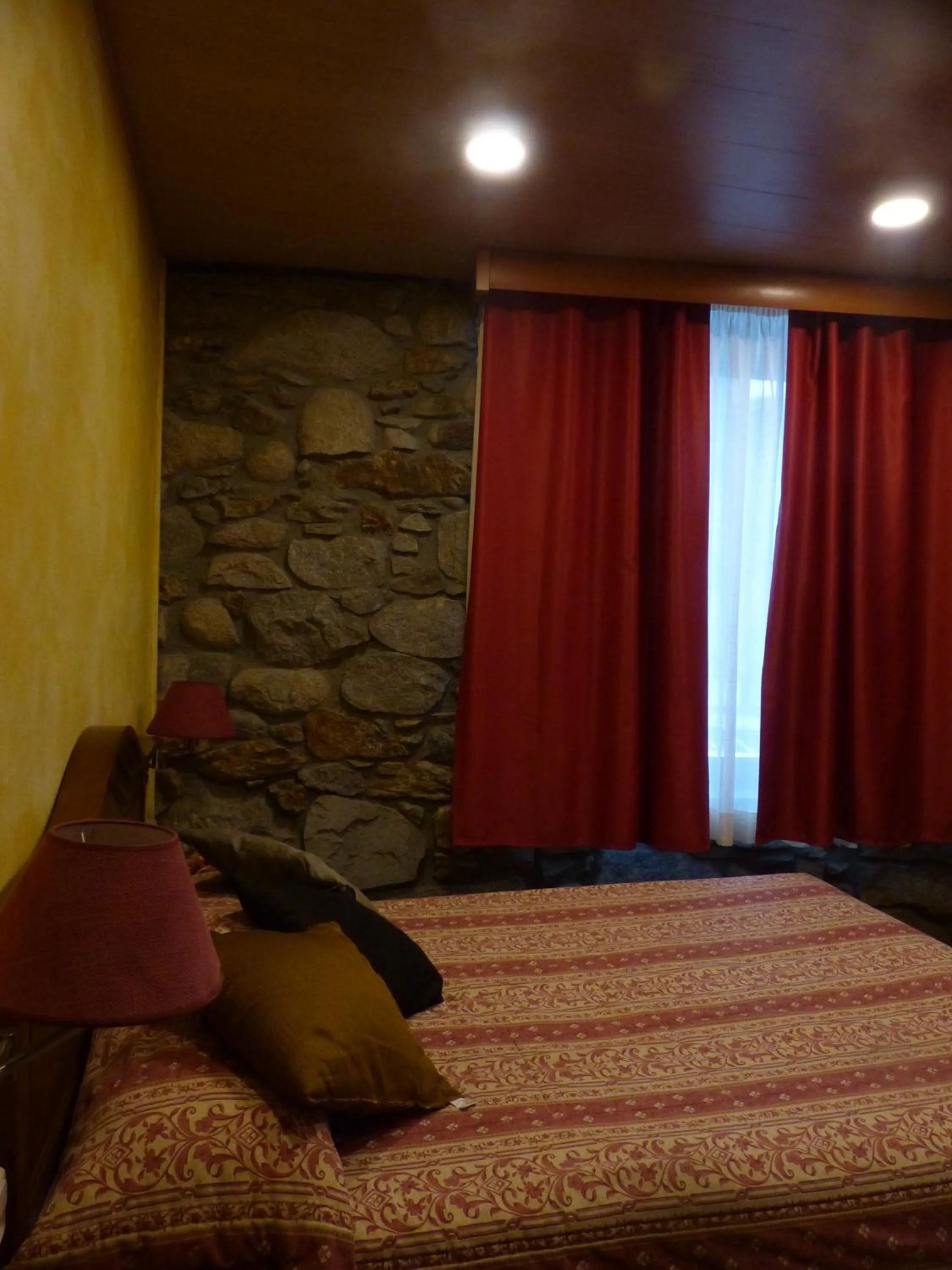 Bed in Hostal Vall D'Aneu by Arcas & Sambola