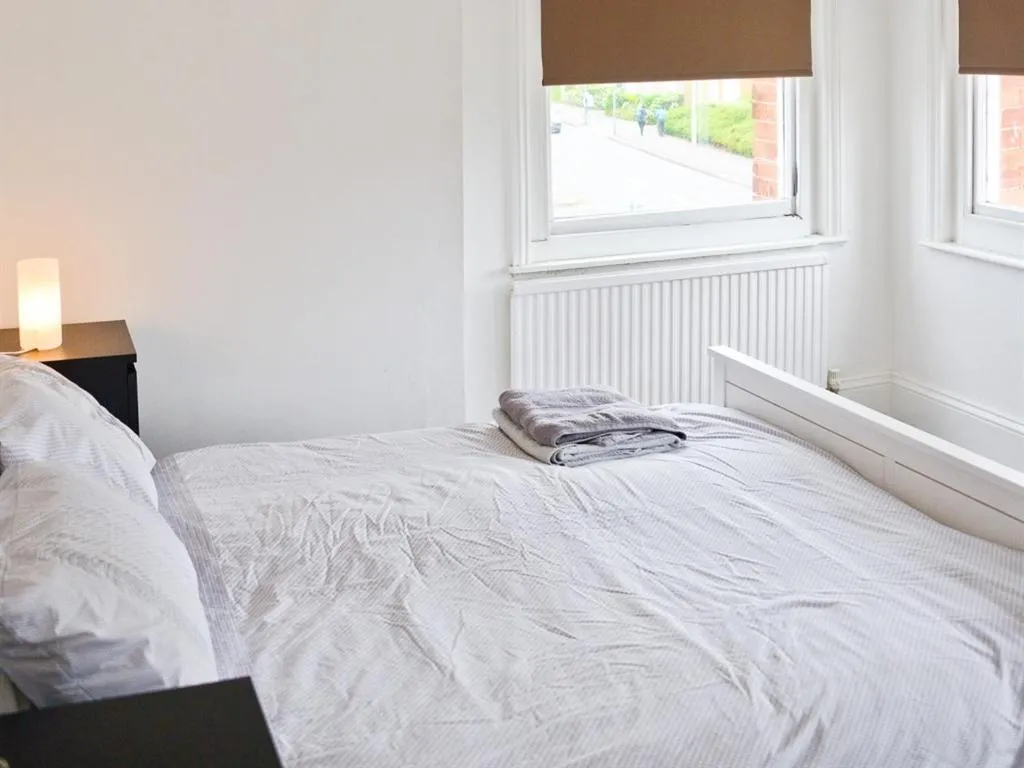 Bedroom, Bed in Corner House apartment