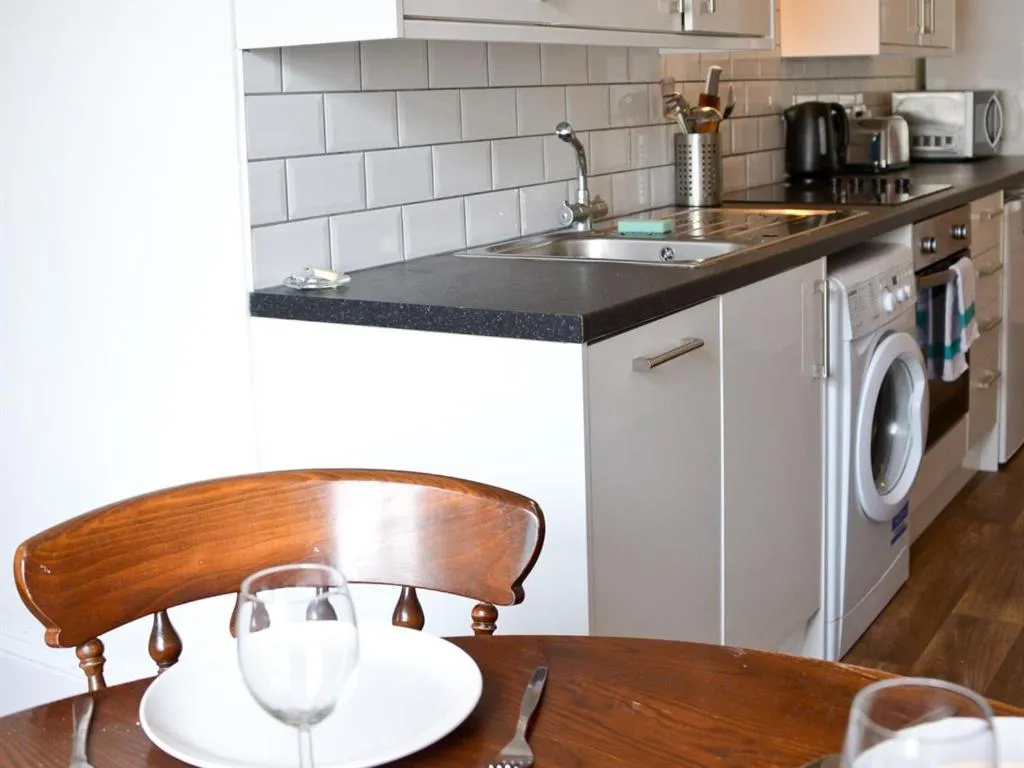 Bedroom in Corner House apartment