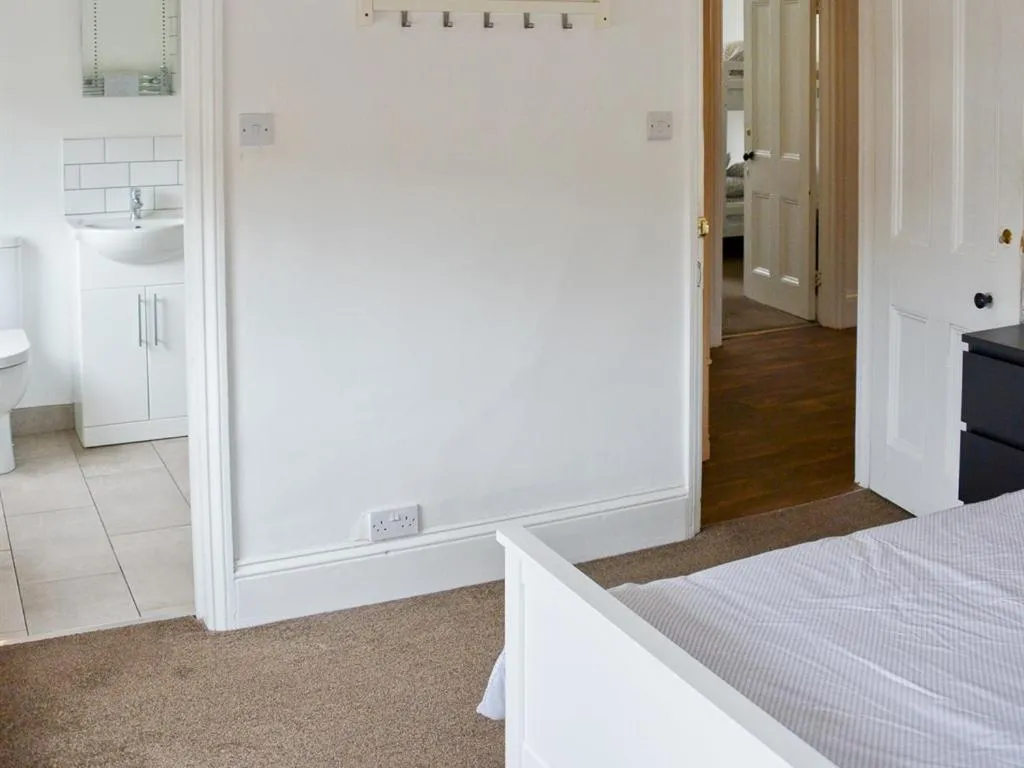 Bedroom, Bed in Corner House apartment