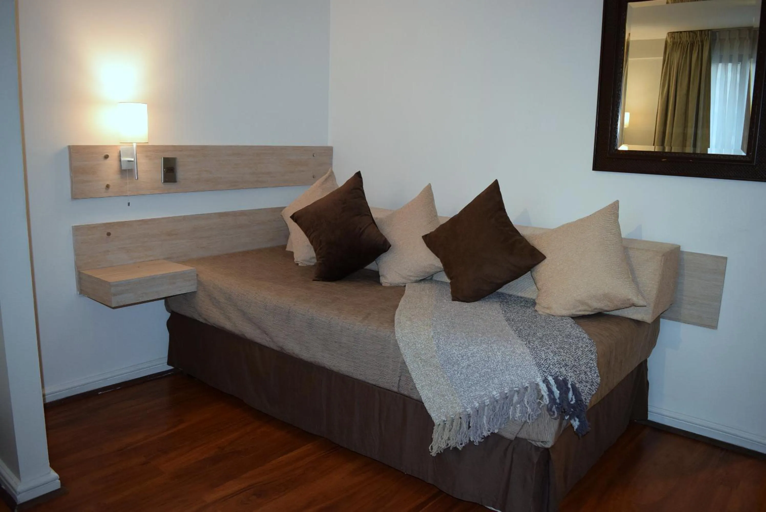 Bed in Apart Hotel Cambiaso