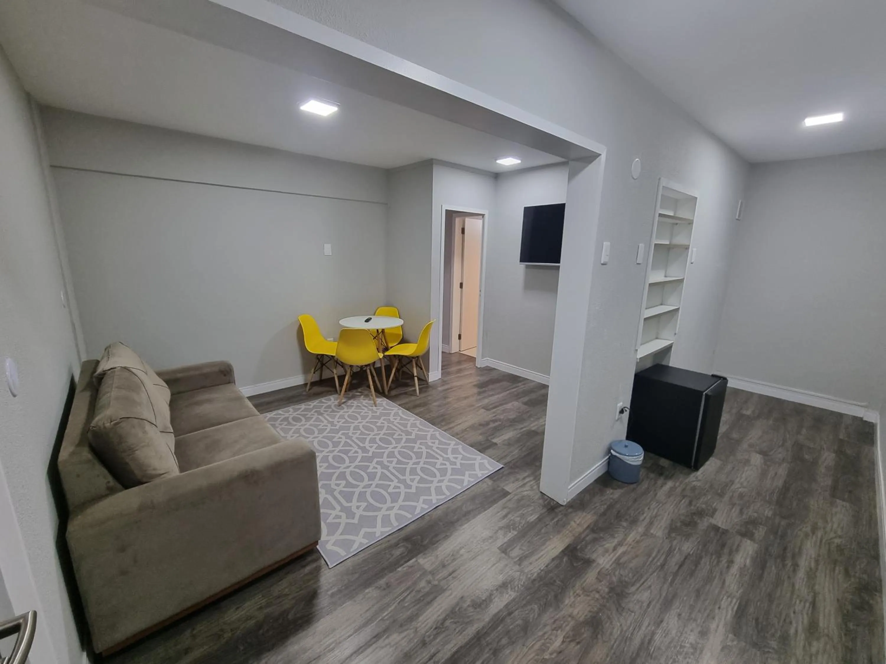 Communal lounge/ TV room in Marambaia Hotel e Convenções