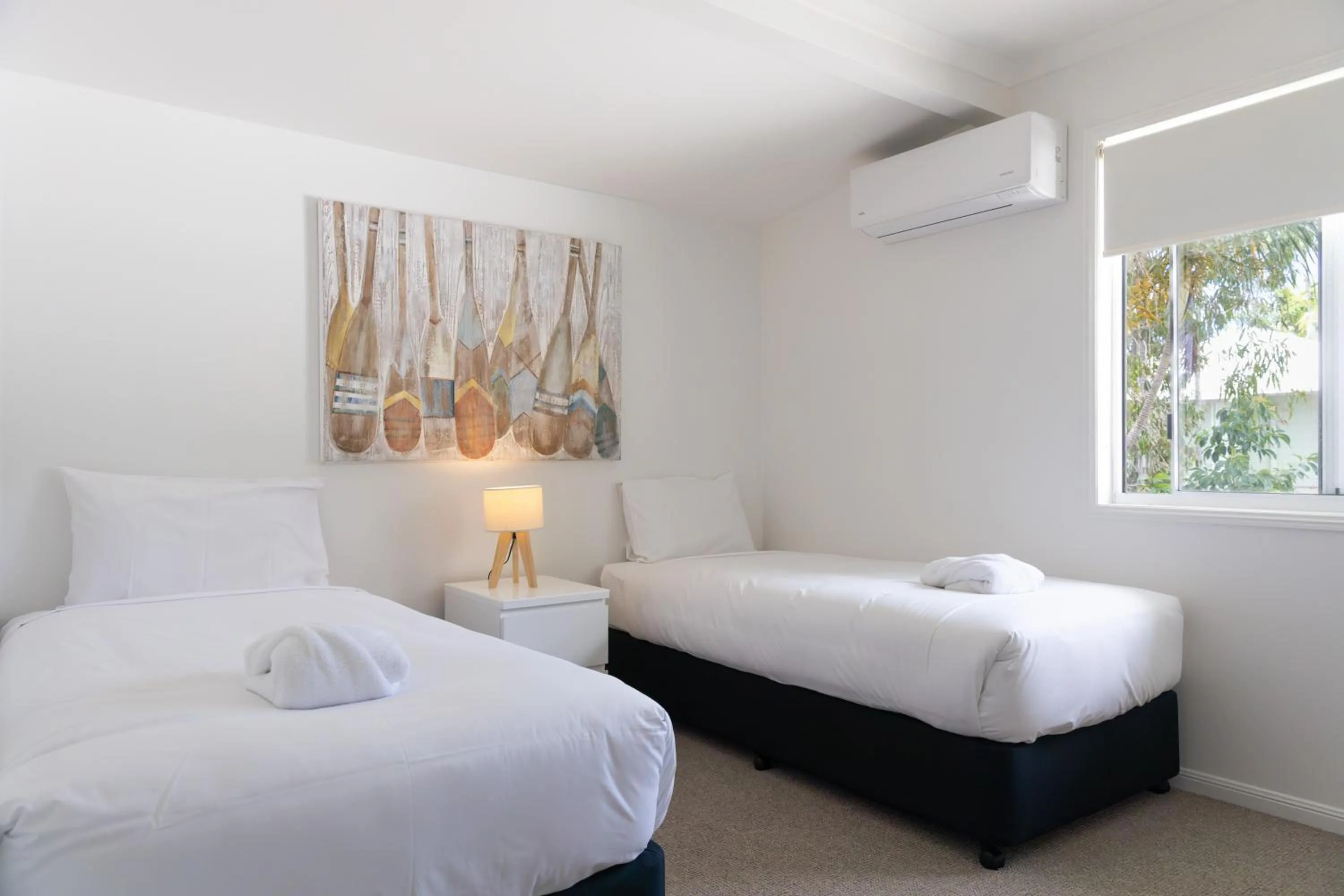 Bed in Coral Beach Noosa Resort