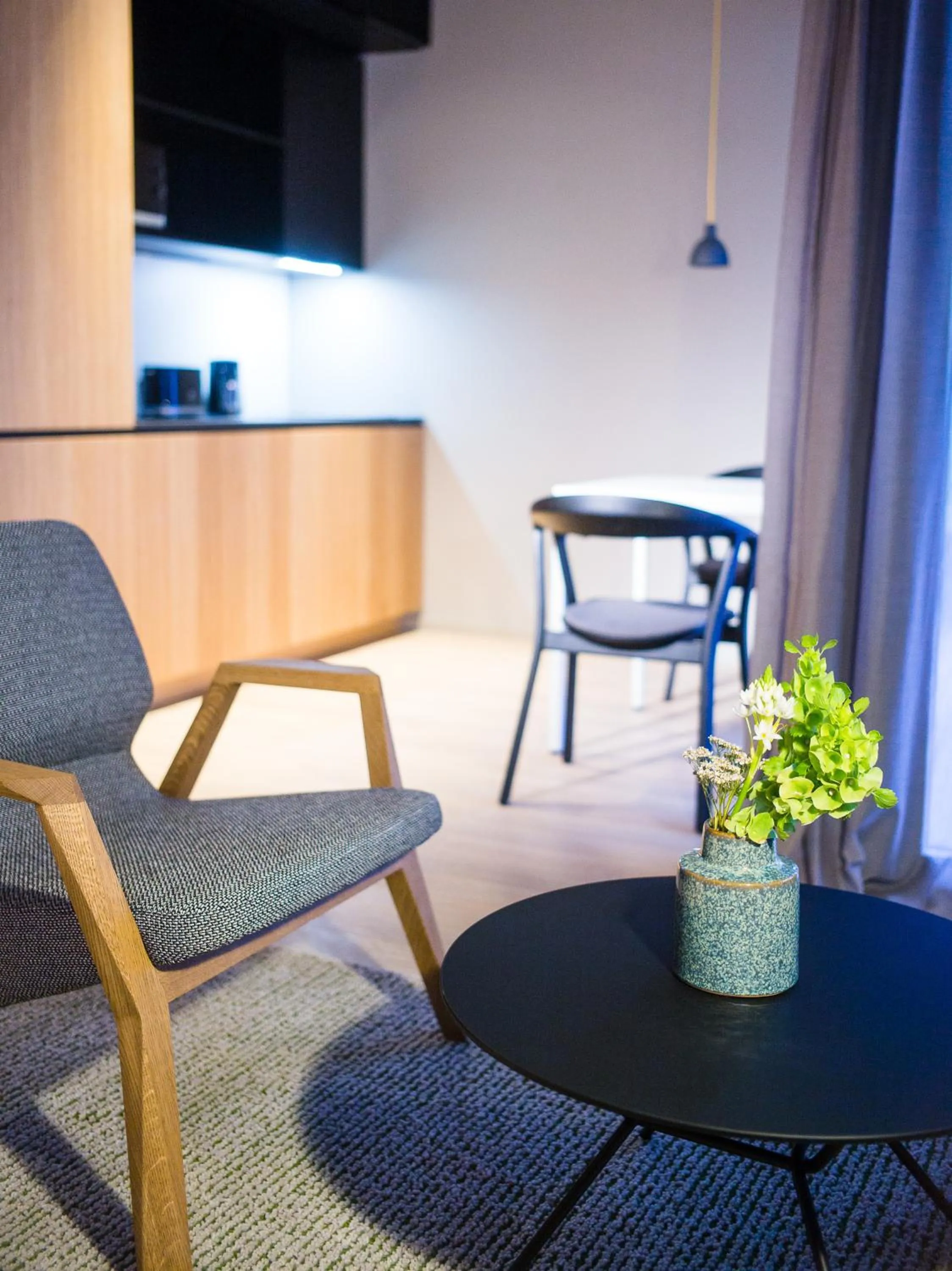 Living room in One Suite Hotel