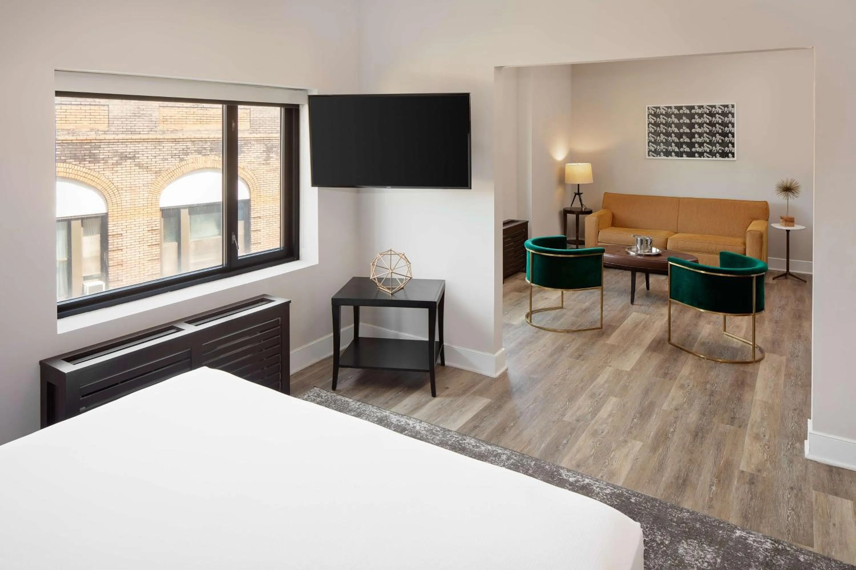 Living room, Bed in Watt Hotel Tapestry Collection by Hilton