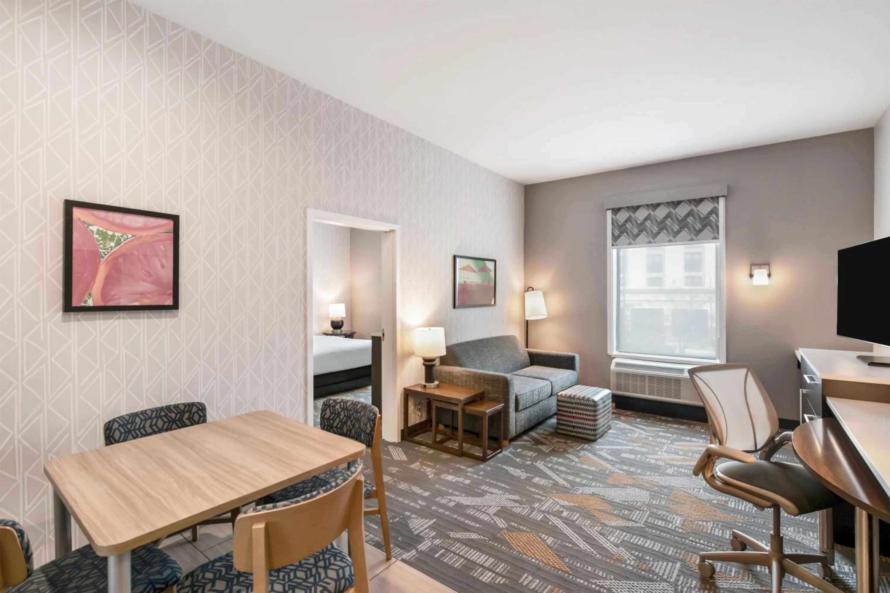 Living room, Bed in Home2 Suites Pensacola I-10 At North Davis Hwy