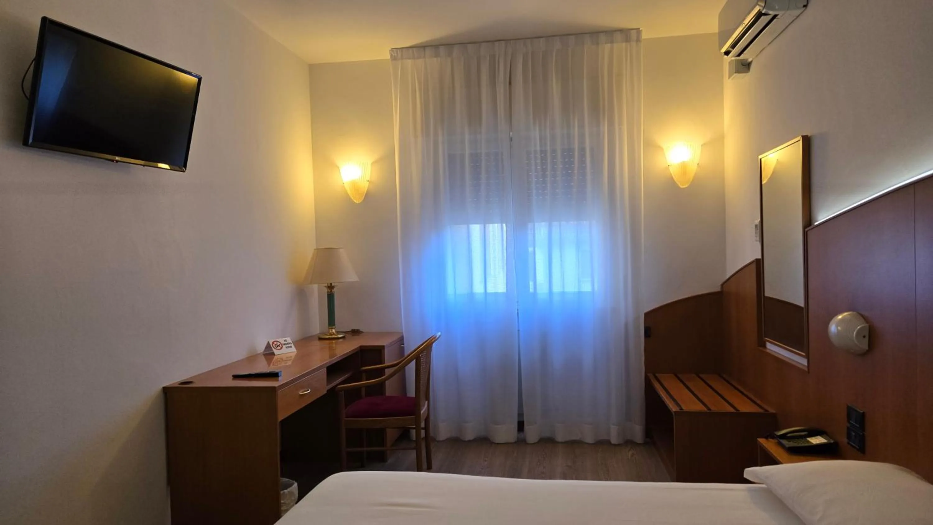 Bed in Hotel Cristallo