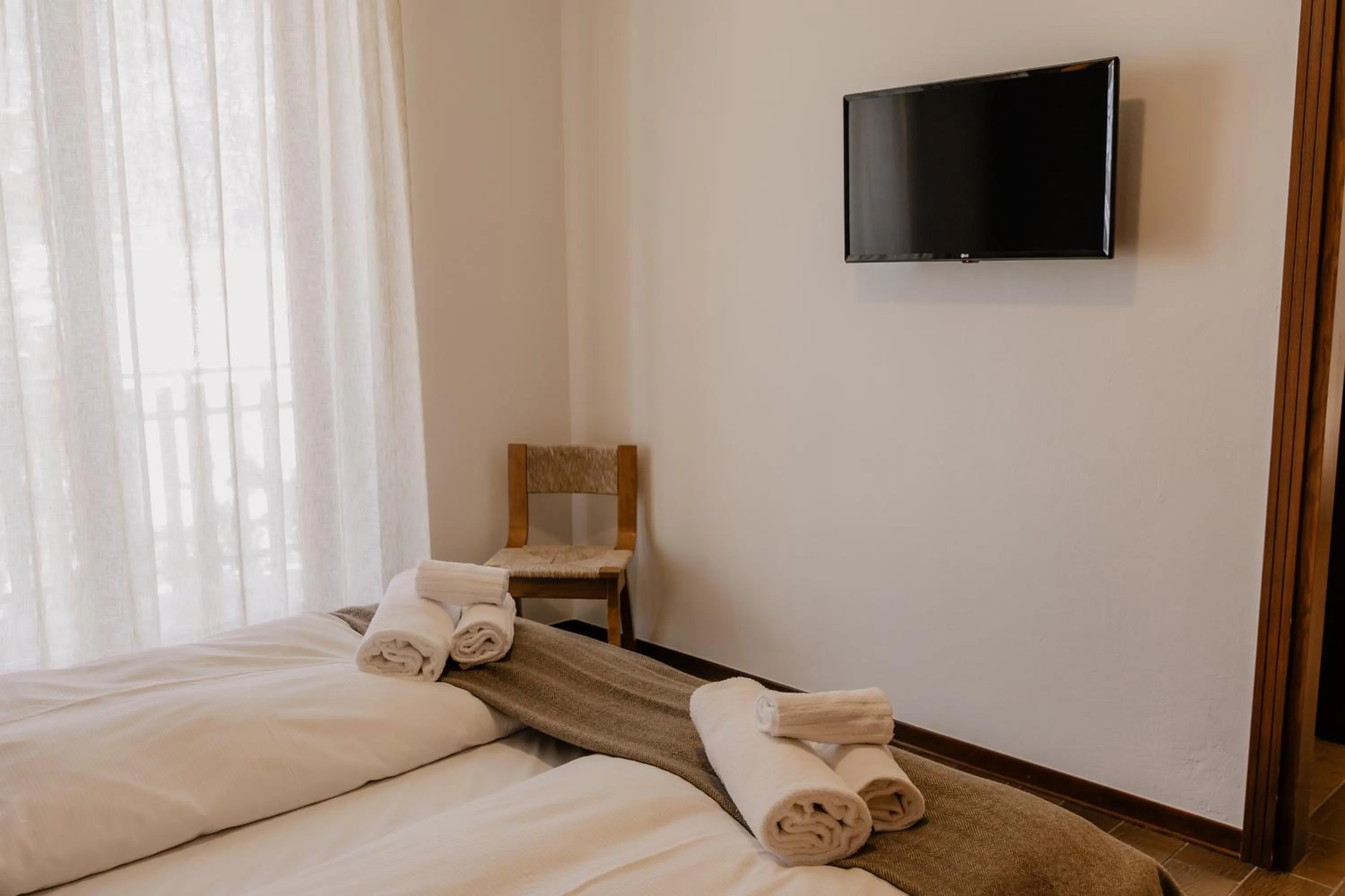 TV and multimedia, Bed in Hotel Costaverde "ai Roni"